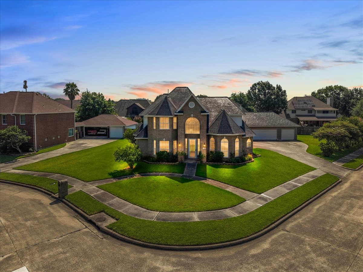 Stunning curb appeal welcomes you to 4402 Santee Drive.