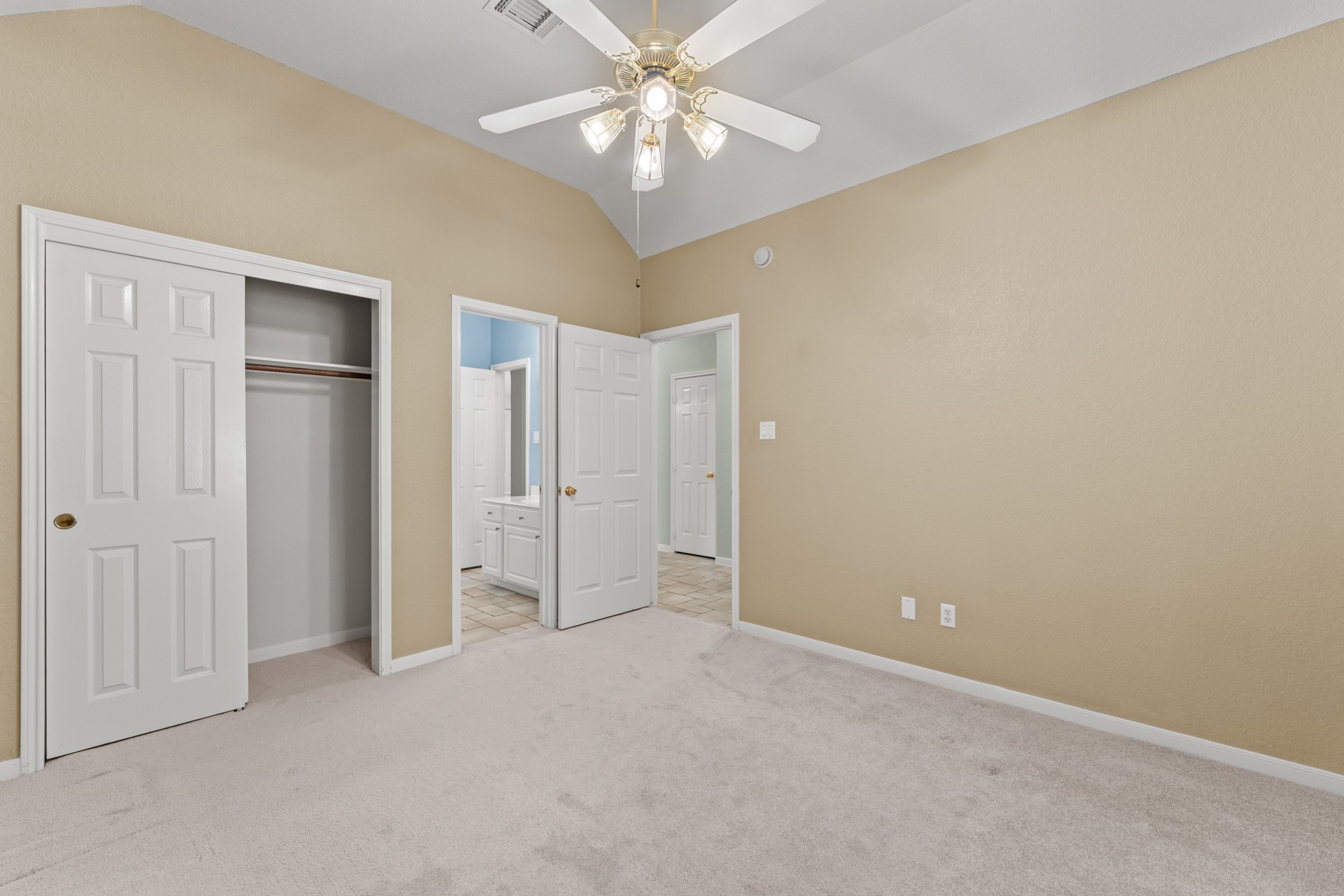 The first guest bedroom shares a jack-and-jill bathroom with the other guest bedroom.