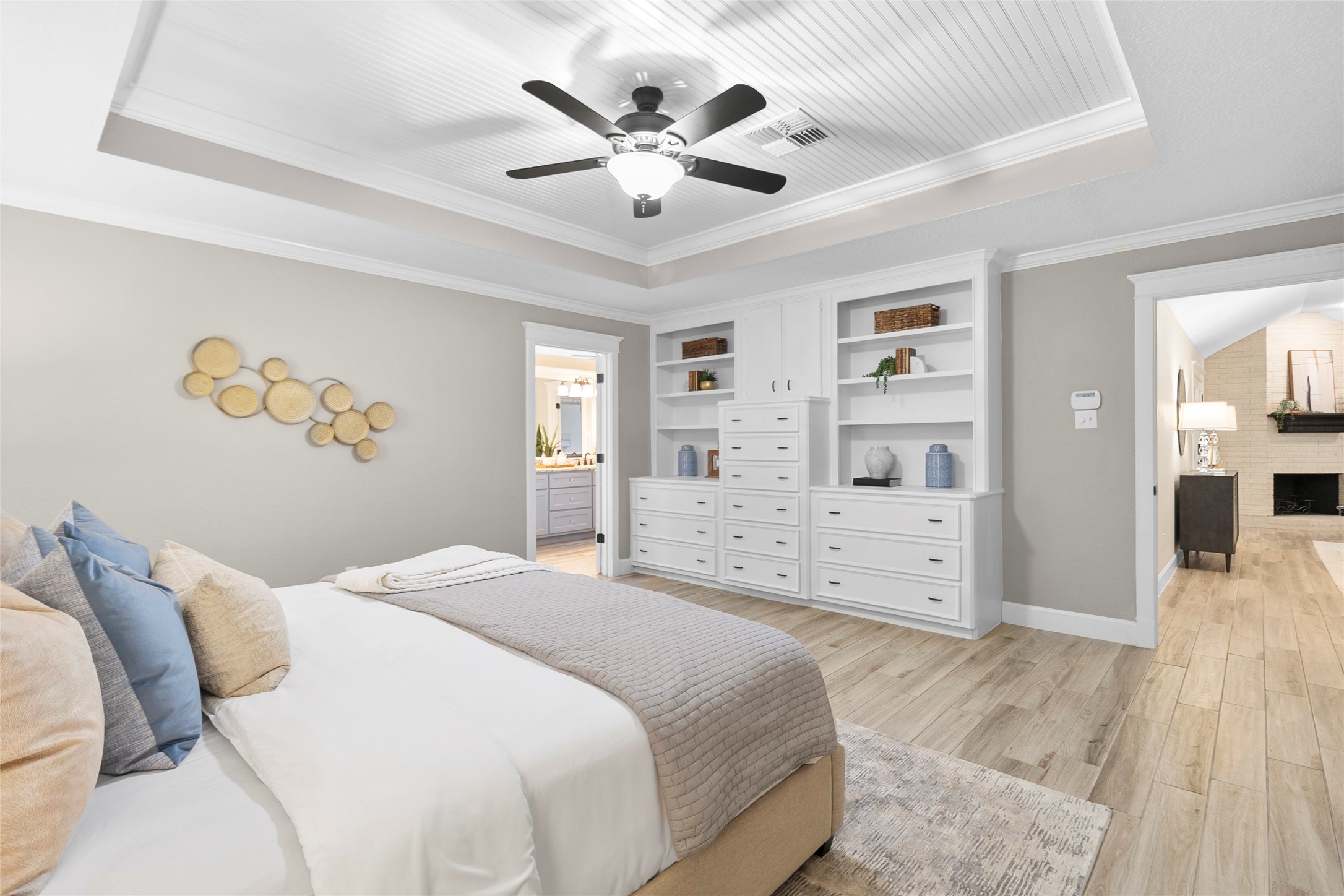 Your primary suite offers the perfect blend of comfort and sophistication with built-in storage, tray ceilings, and plenty of space to truly relax and recharge.