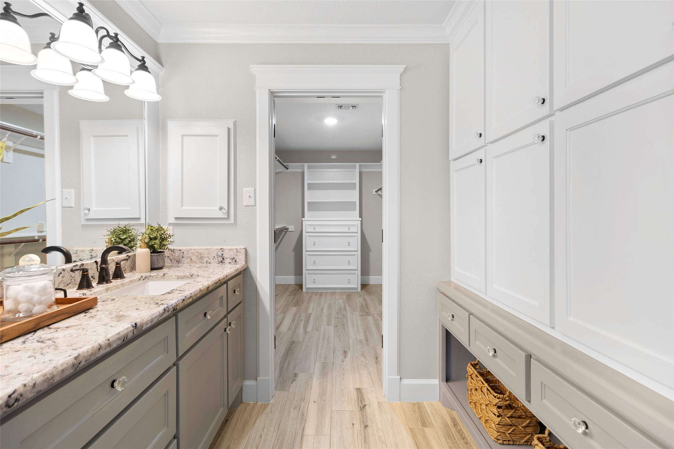 The thoughtfully connected primary bath and custom closet create a private retreat that feels both functional and luxurious every single day.