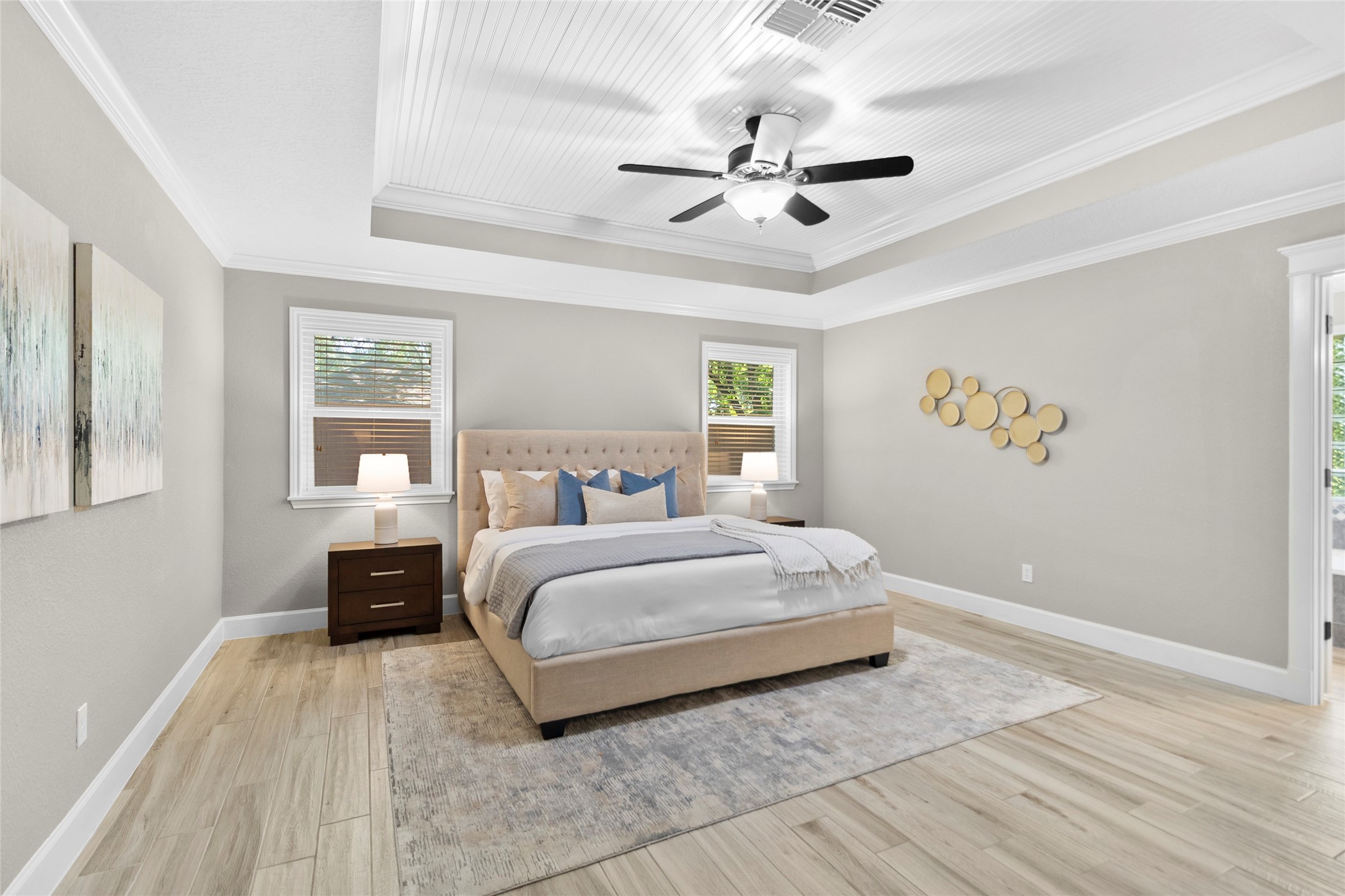 Your spacious primary suite welcomes you with soaring tray ceilings, soft natural light, and plenty of room to create the peaceful retreat youve been dreaming about.