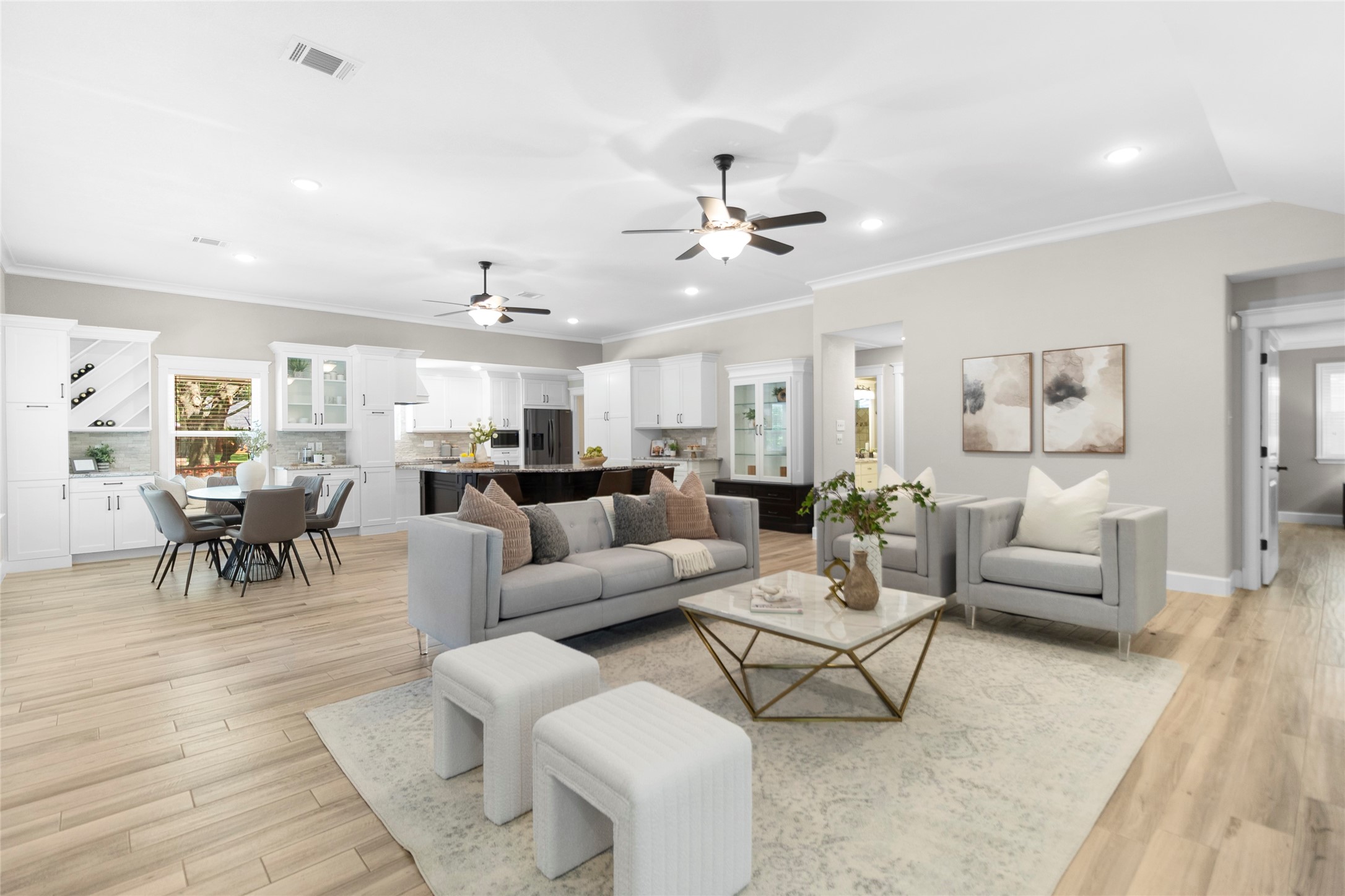 Natural light pours through this beautifully designed living space, creating the perfect backdrop for cozy nights in, entertaining friends, or simply enjoying everyday life at home.