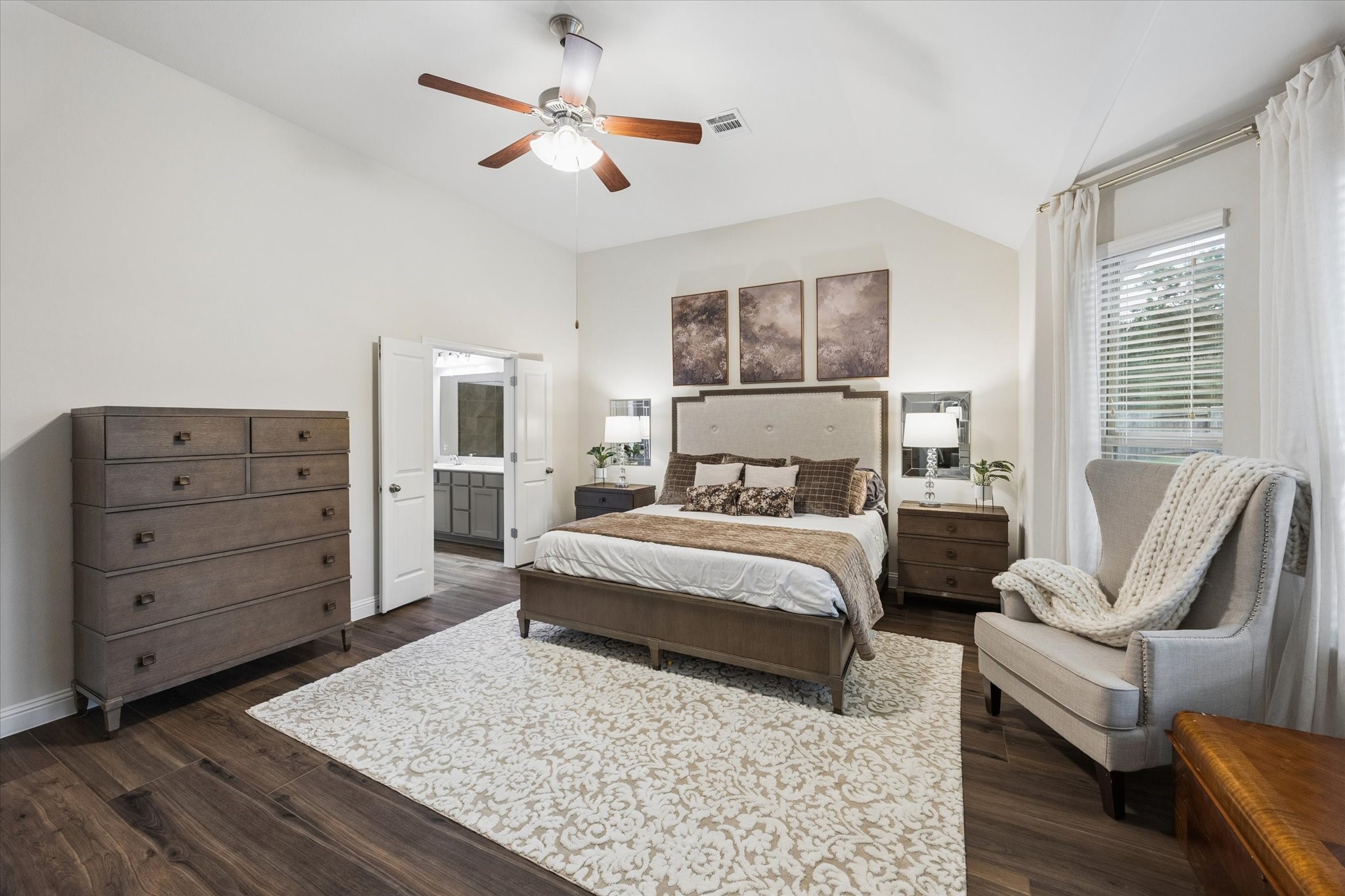 Great size primary bedroom that has spacious seating areas that creates a comfortable retreat for relaxing.
