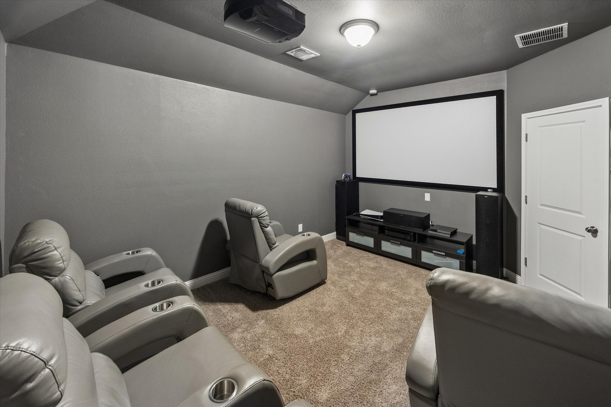 Whether hosting a big game, enjoying a family film, or settling in for a favorite series, this dedicated entertainment space brings luxury and leisure home in style.
