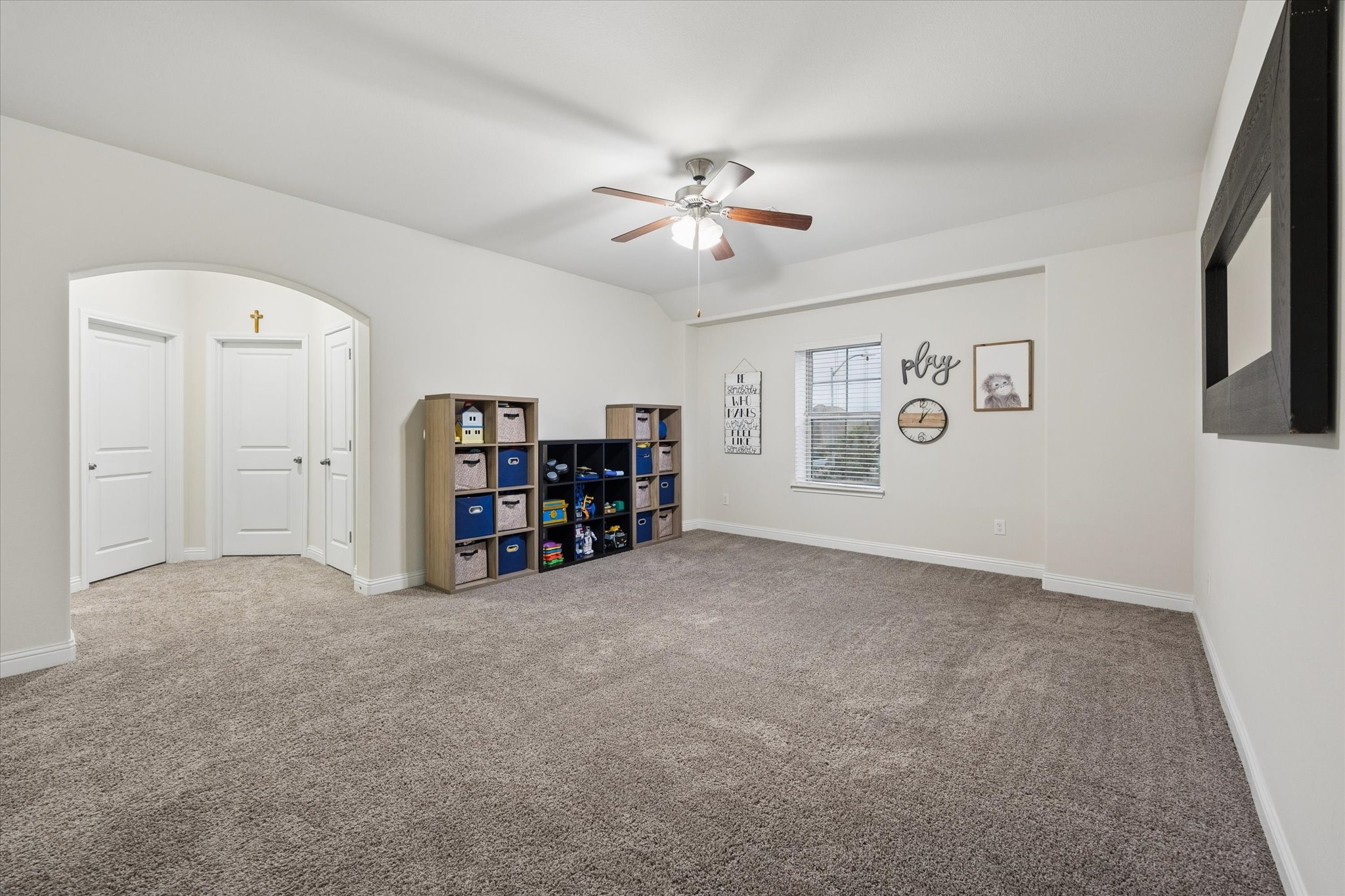 This game room is oversized and designed to grow with your needs as a play room, dedicated home school area or a home gyme.