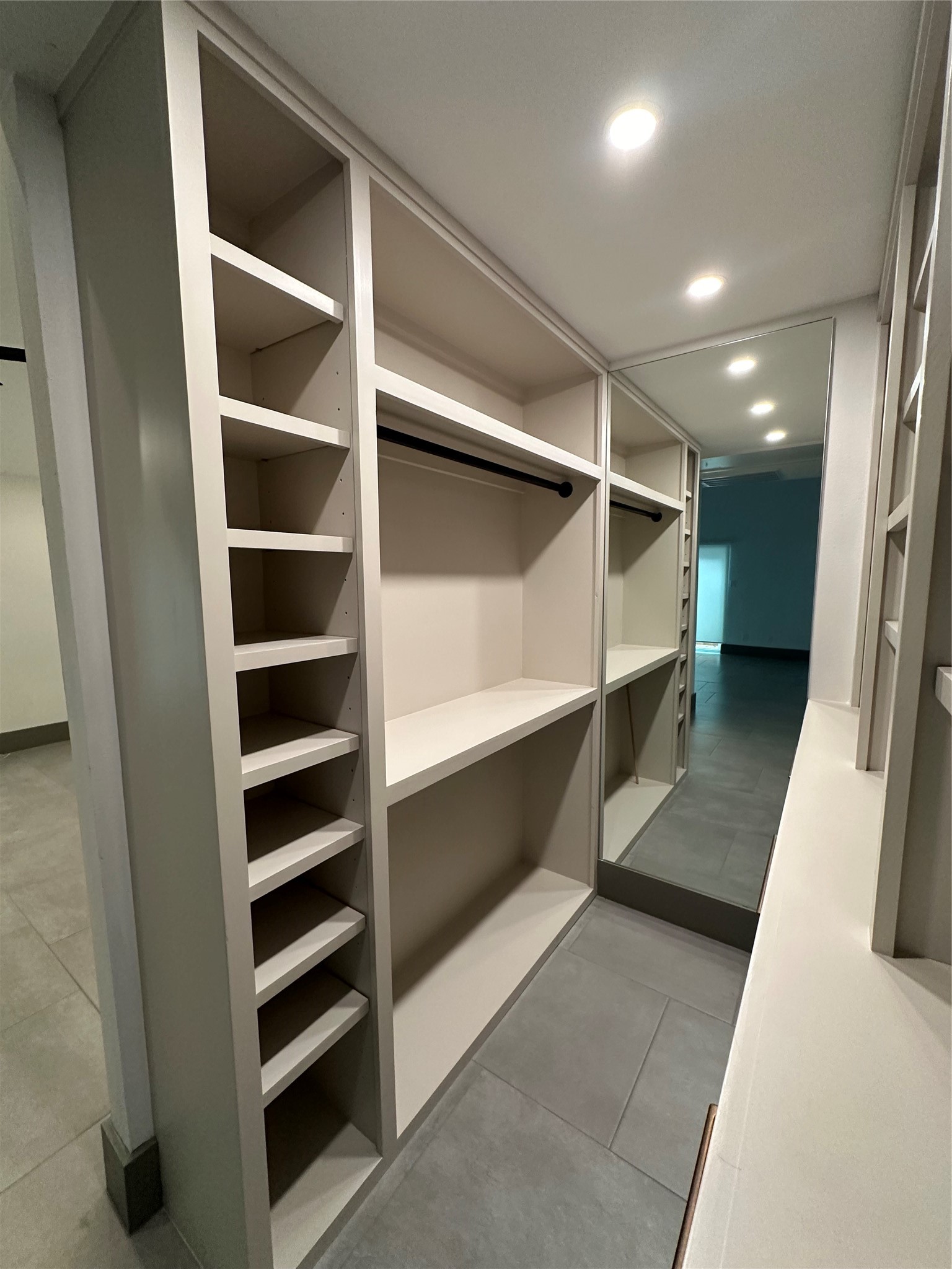 Totally Custom Closet with plenty of shelves Hanging space and built in dresser.