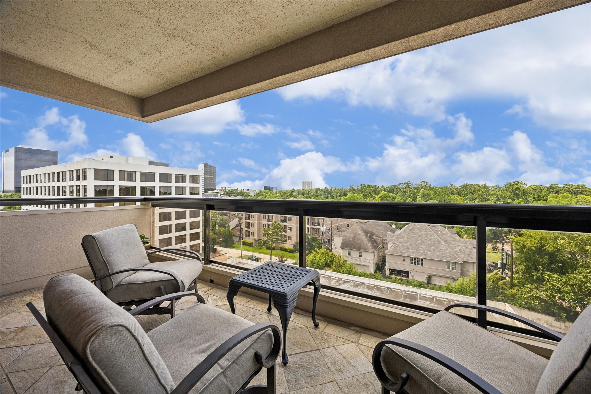 Large, covered balcony facing north with above the treetop views!