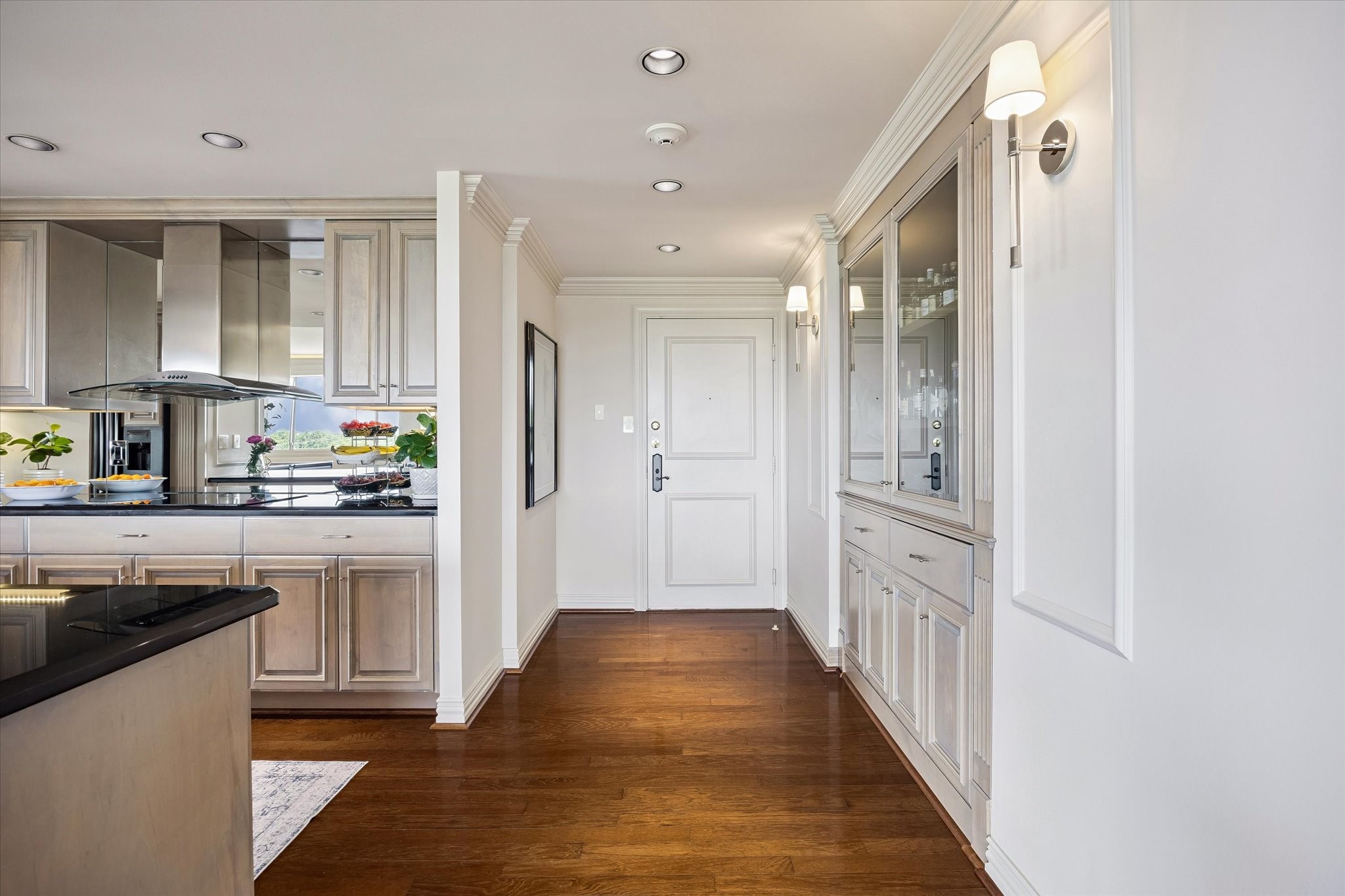 Lovely entry, hardwood floors, recessed lighting...