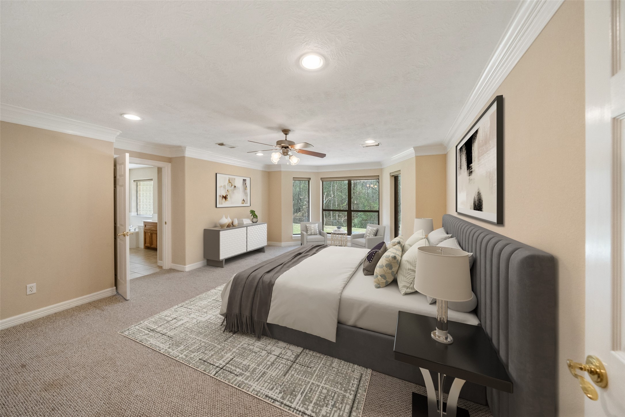 This spacious virtually staged first floor primary bedroom with a cozy seating area by the window. An en-suite bathroom for added convenience. This spacious virtually staged first floor primary bedroom with a cozy seating area by the window. An en-suite bathroom for added convenience.