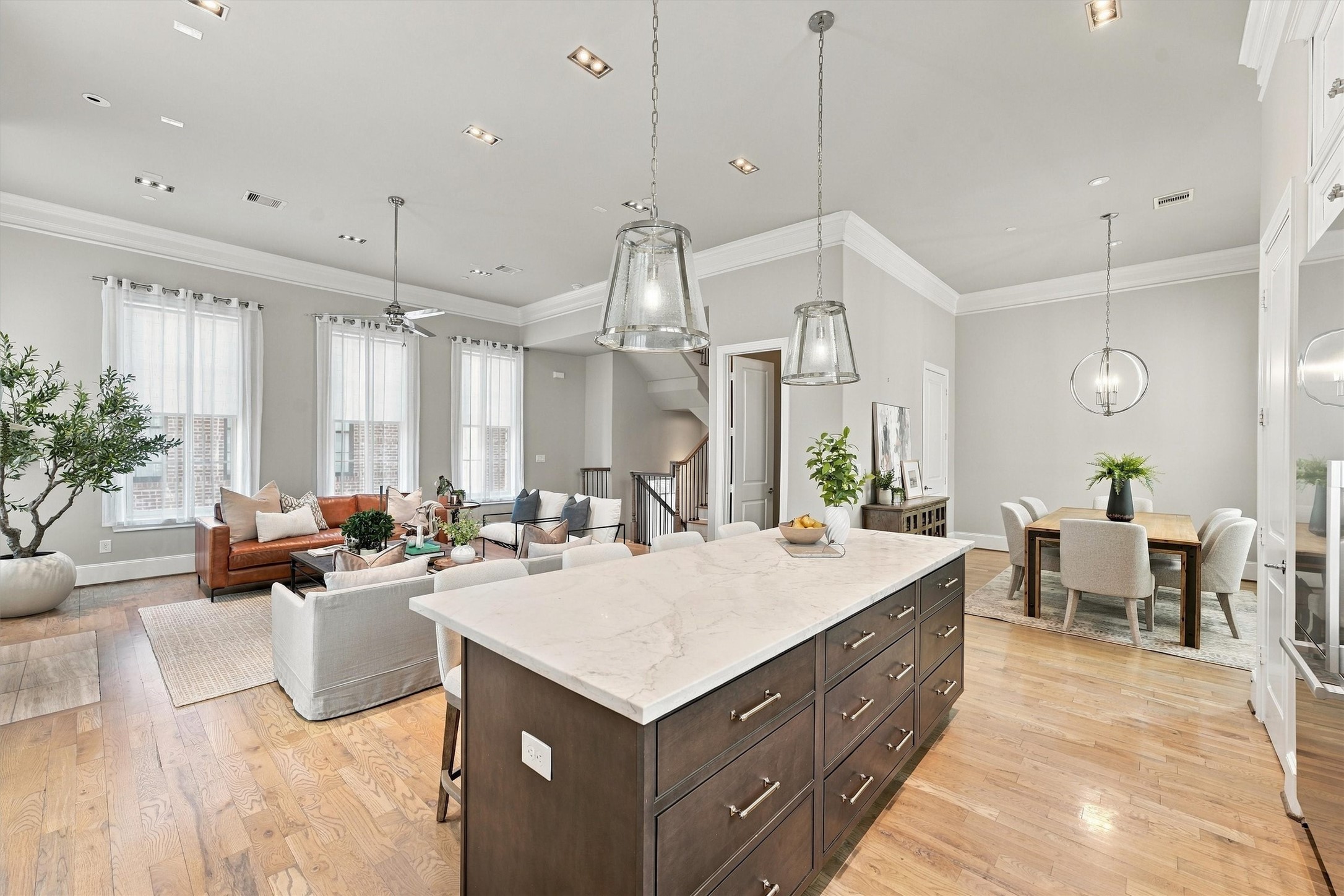 Espresso-stained island with sight lines to the great room and dining area