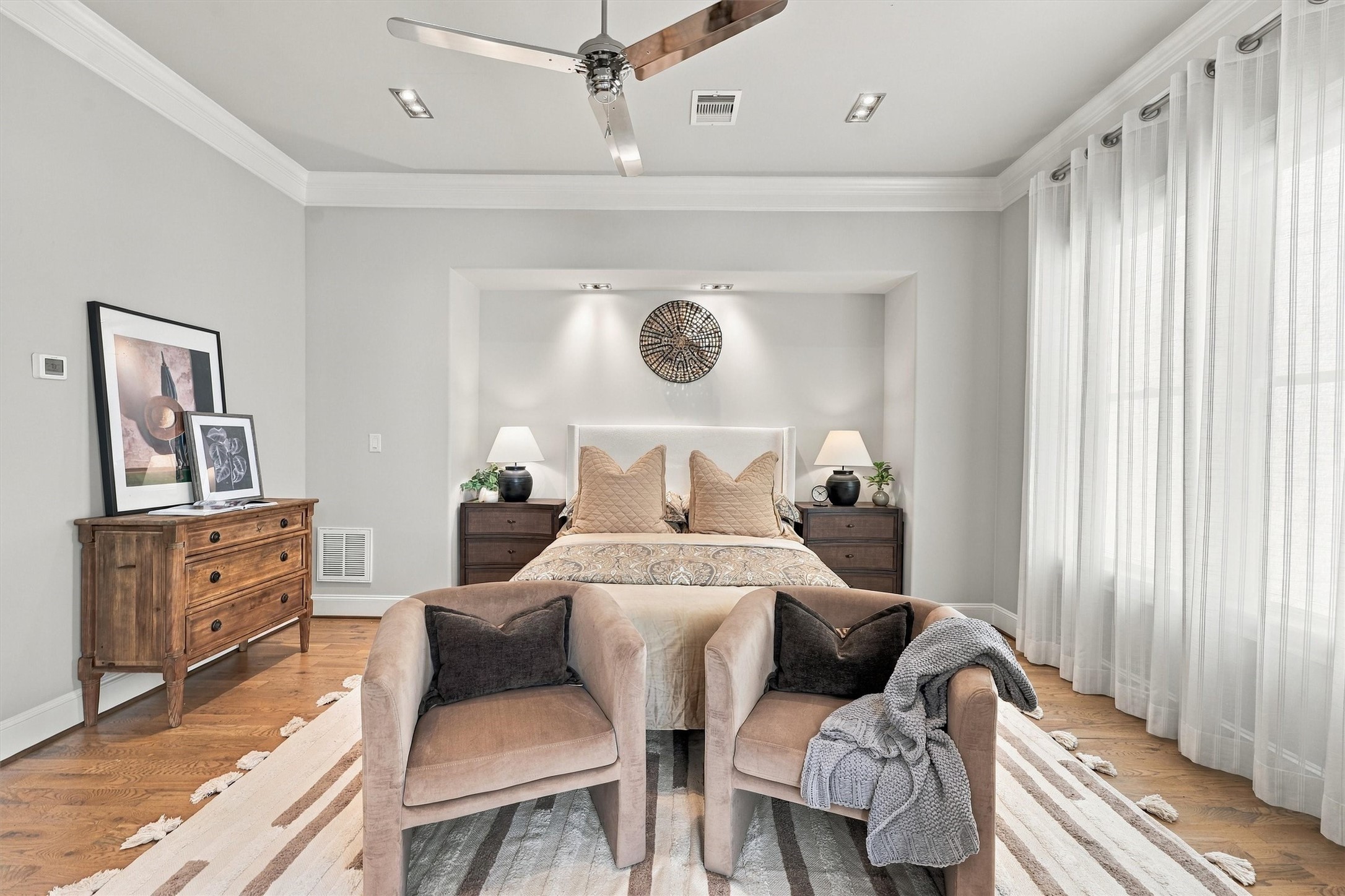 Primary suite with room for a sitting area at the foot of the bed