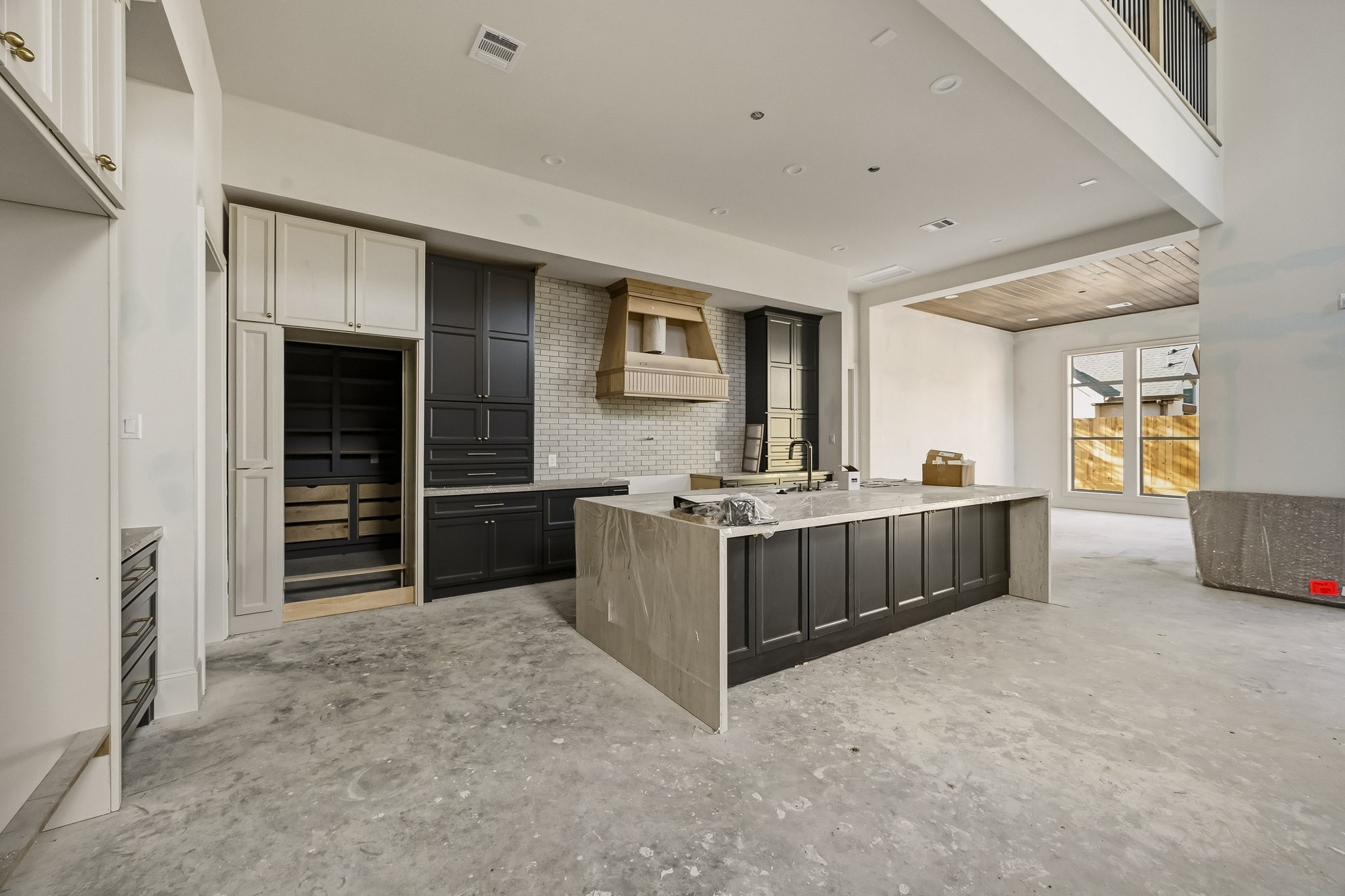 Open concept kitchen with hidden scullery and oversized island!