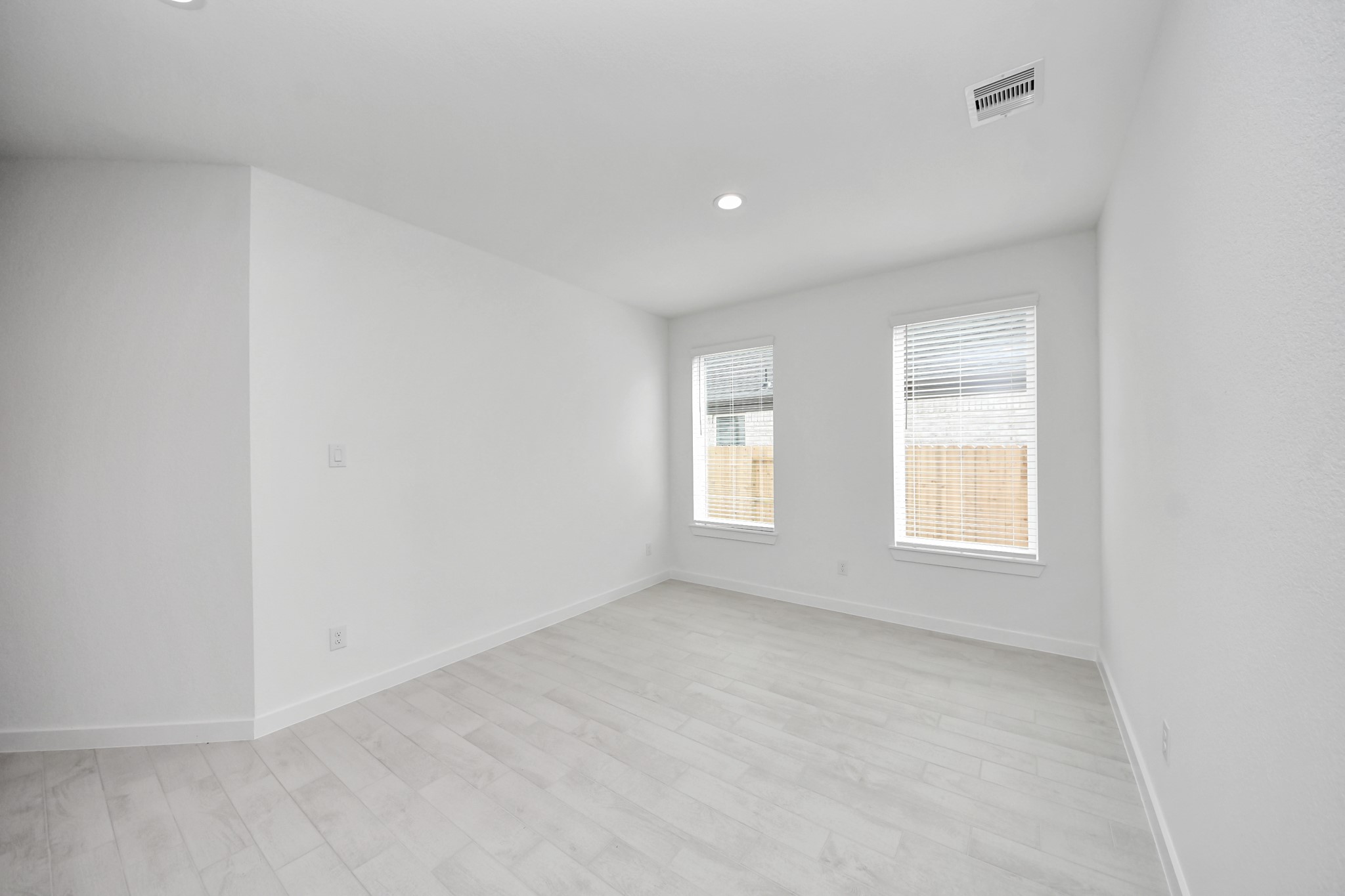 Make memories gathered around the table with your family and friends! This spacious dining room features elegant flooring, custom paint, and adjacent to family room and kitchen for open concept feel. Sample photo of completed home with similar floor plan. Actual colors and selections may vary.