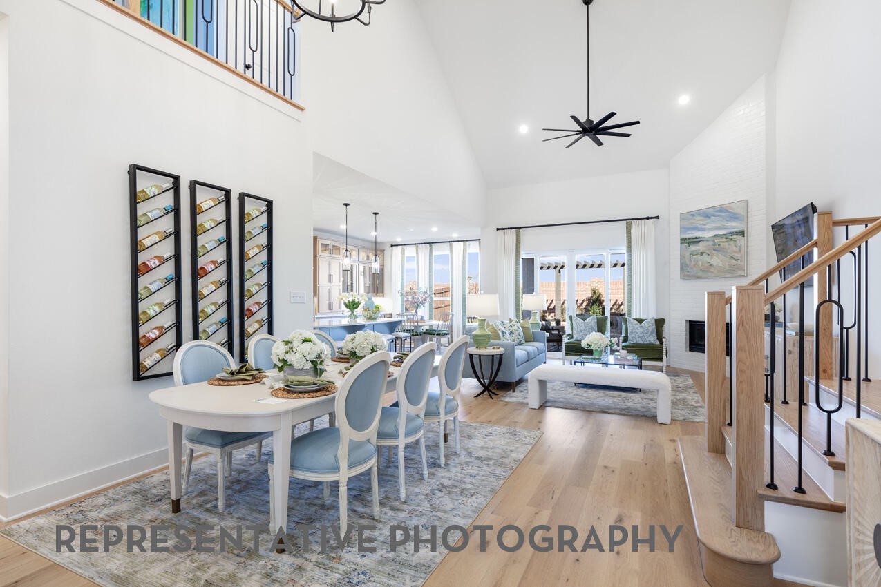 Open dining area with soaring ceilings and seamless flow into the main living spaces. Open dining area with soaring ceilings and seamless flow into the main living spaces.