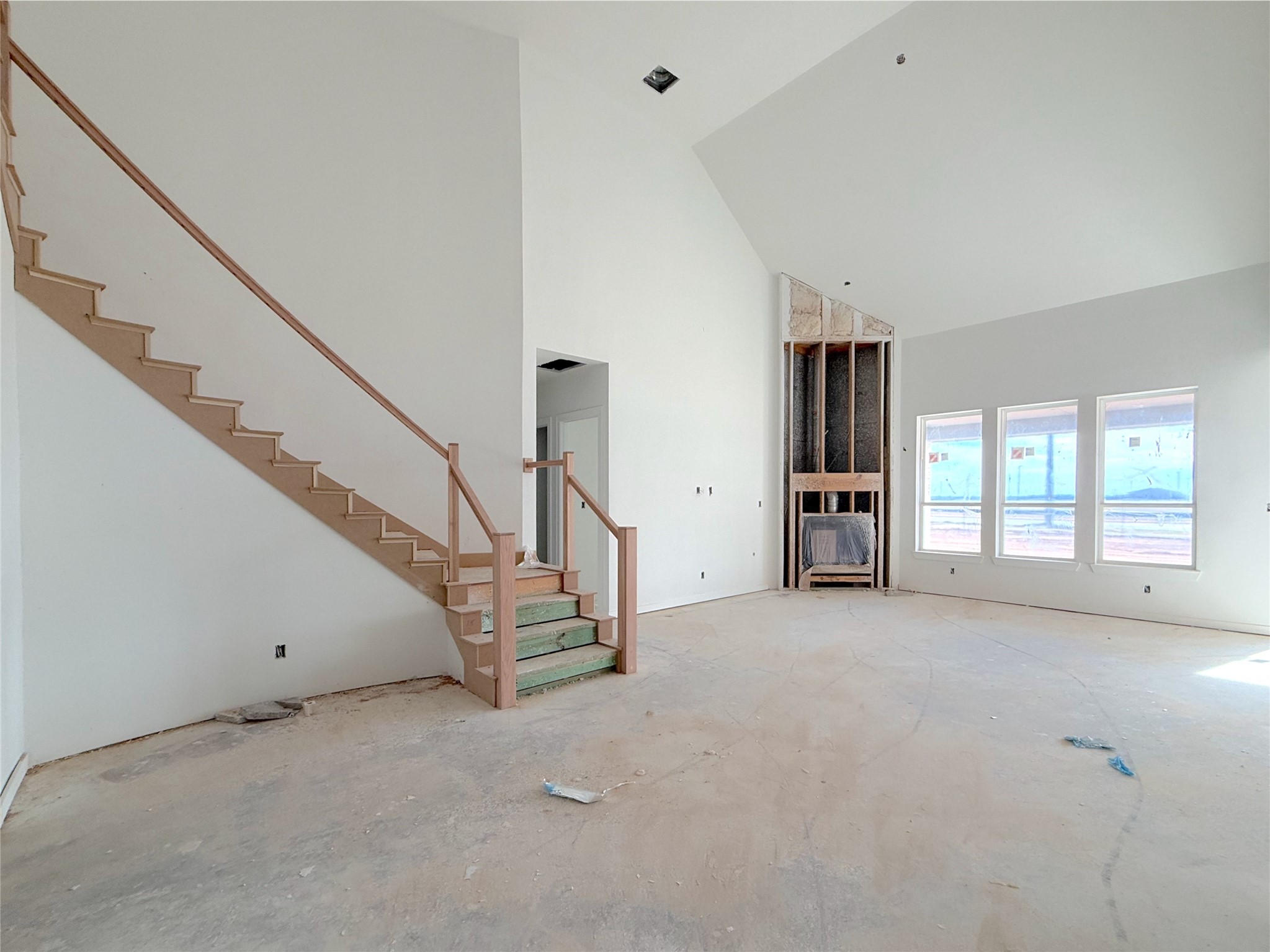 Seamless flow of the stairs into the dining and living areas. Seamless flow of the stairs into the dining and living areas.
