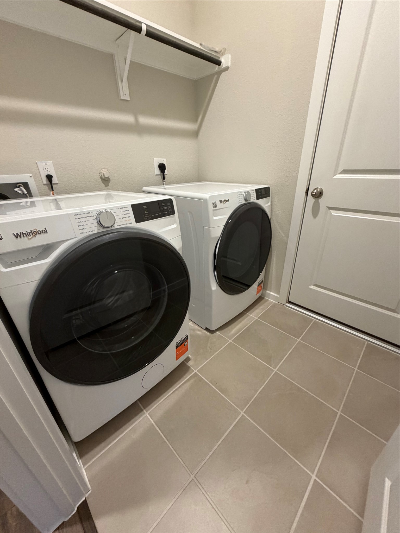 Washer and dryer room.