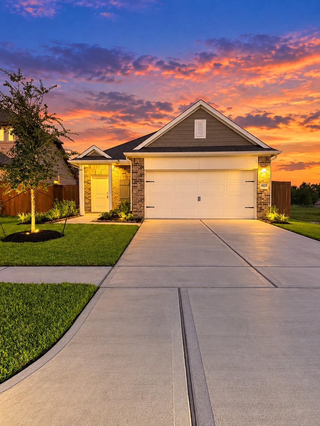 Twilight dusk exterior frontage of home.