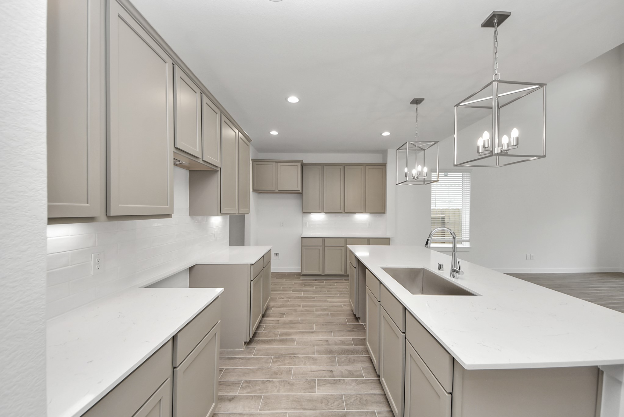 All of this overlooks your expansive family room, creating a perfect space for culinary delights and family gatherings.