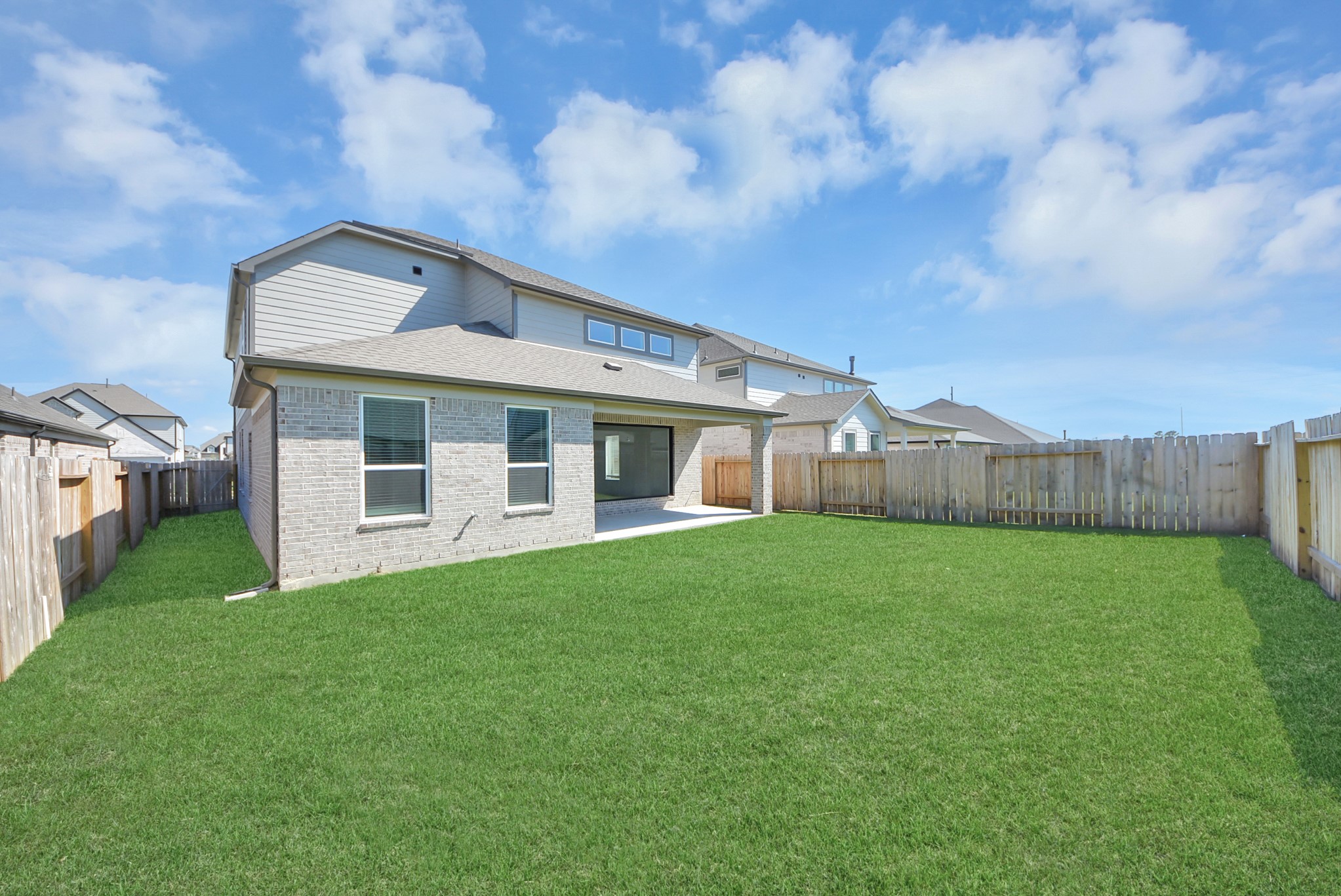 Explore the expansive backyard with its inviting covered patioa perfect blend of space for the kids to play and adults to unwind. Ideal for creating your outdoor oasis, this backyard accommodates patio furniture, a BBQ pit, and endless possibilities for leisure and entertainment.