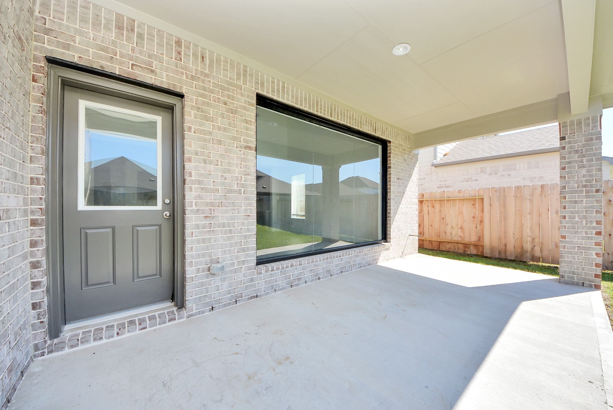 Come and see this spacious backyard with its beautiful covered patio. There is plenty of room for the kids to play and adults to relax. Perfect for your outdoor living space, patio furniture, bbq pit, and so much more. The possibilities are endless!