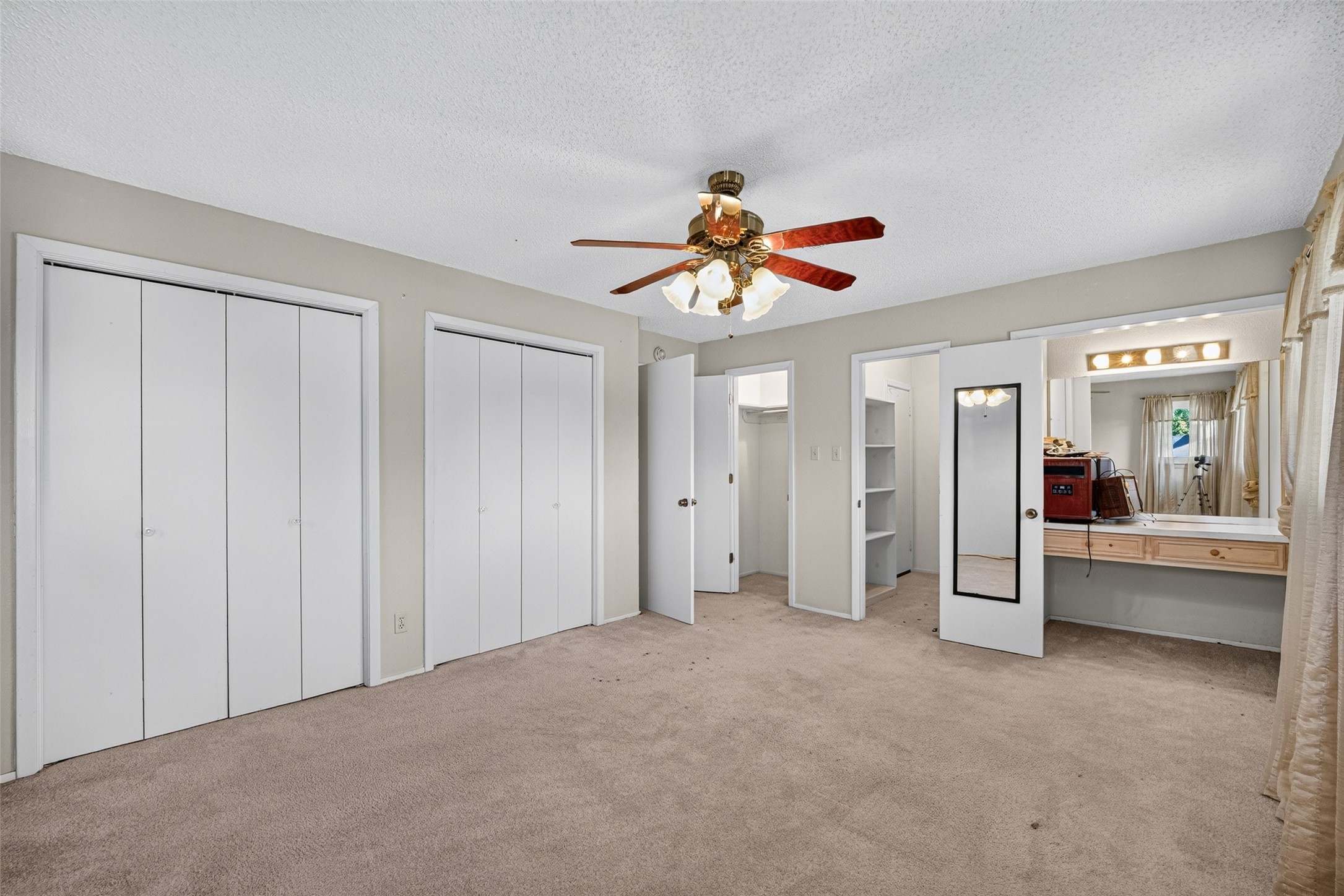 Another view of primary bedroom