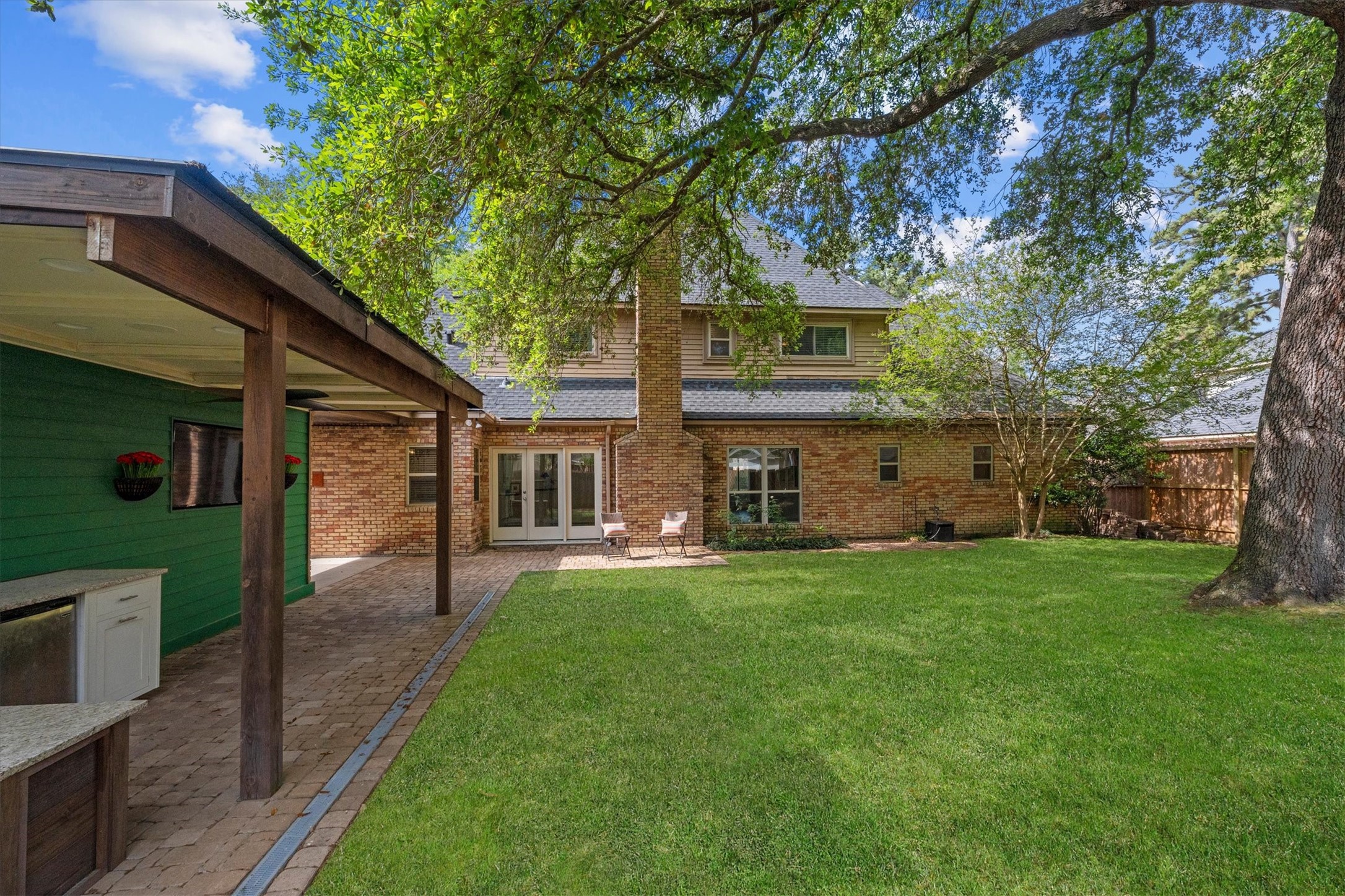This backyard is a serene oasis also perfect for entertaining and spending time together.