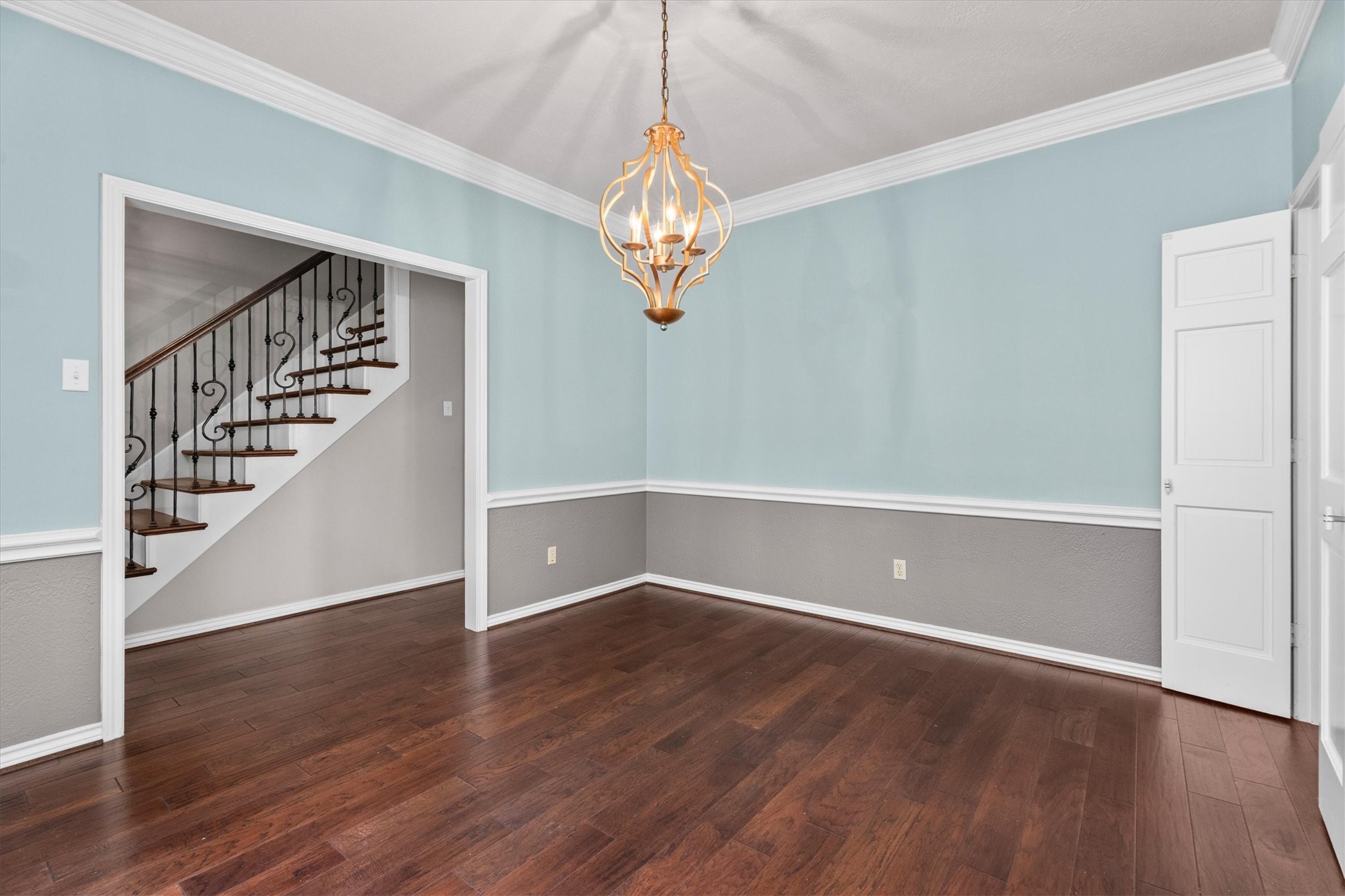 The formal dining room efficiently connects the entry to the kitchen and is the perfect space for gathering.