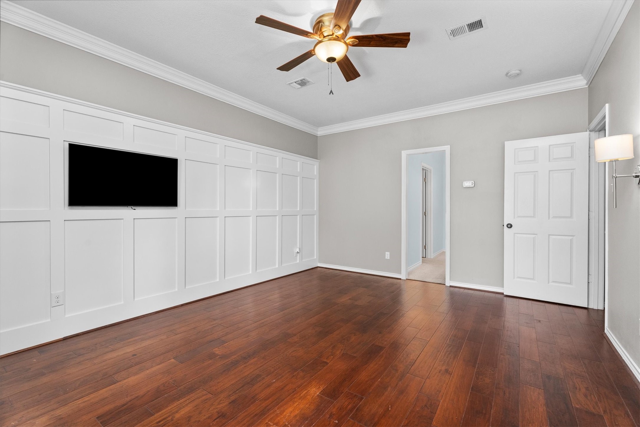 A large primary bath and walk-in closet are located off the bedroom.
