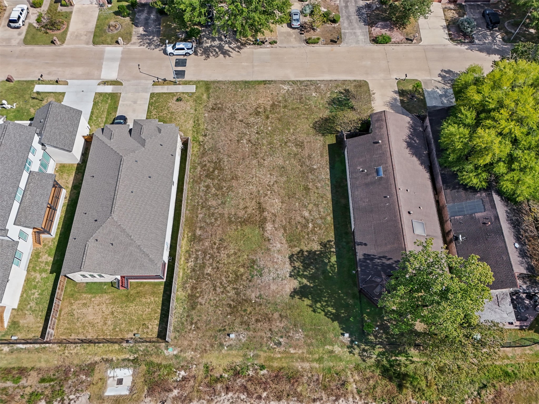 Nestled between established homes in an existing neighborhood, this vacant lot provides a beautiful blank canvas to design your ideal home and outdoor living space. Your vision, your dream home, your future starts here!