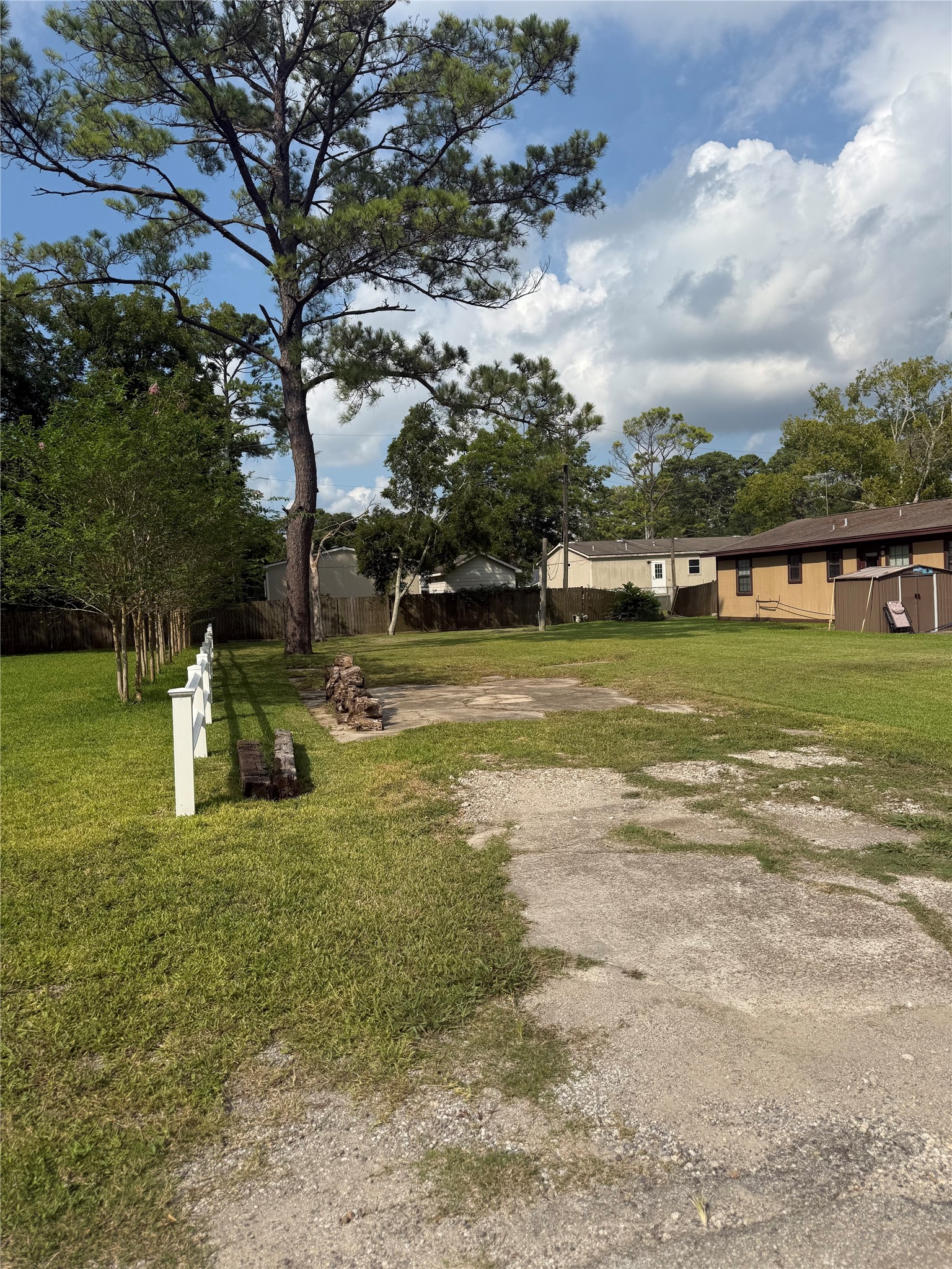 Side angle view of land. Home is not part of the land. Mobile Homes are not allowed.