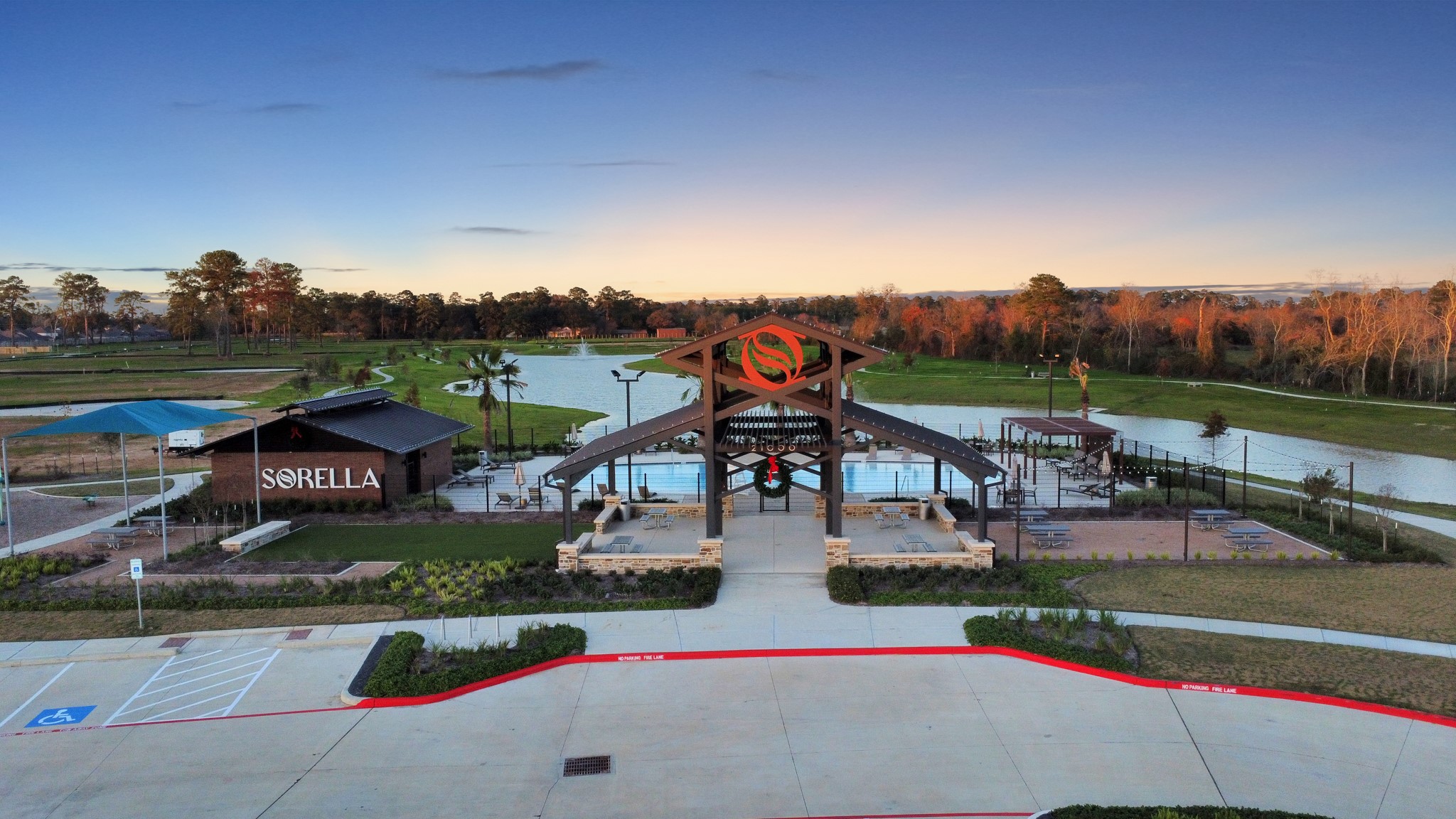 The central hub for community gatherings, featuring an open-air pavilion (right) ideal for events, parties, and family cookouts