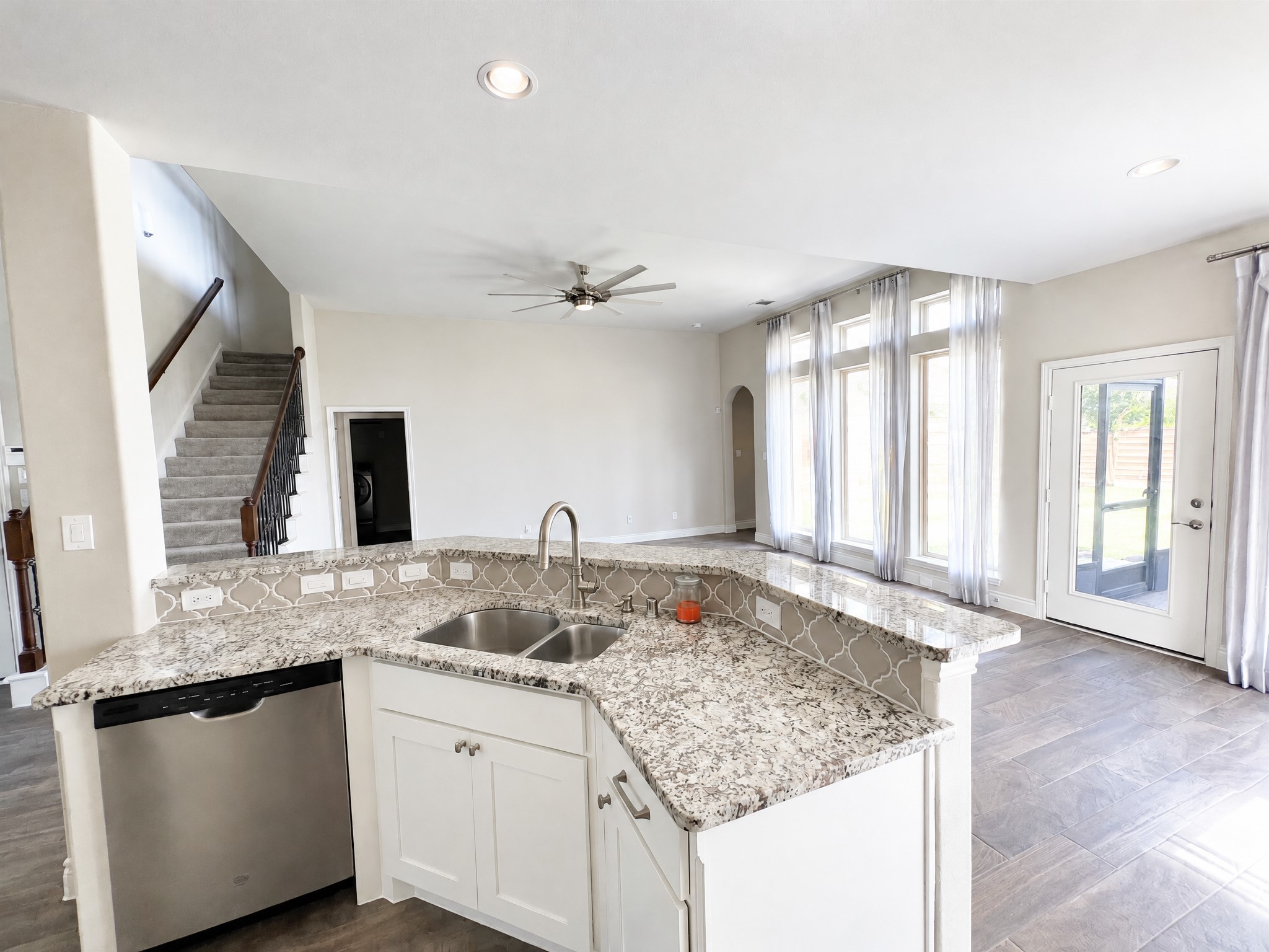 Kitchen contains large gas range with appliances. Kitchen contains large gas range with appliances.