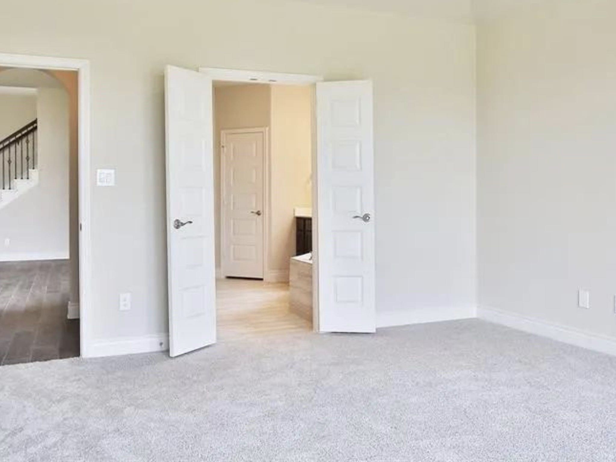 Beautiful primary bedroom downstairs.