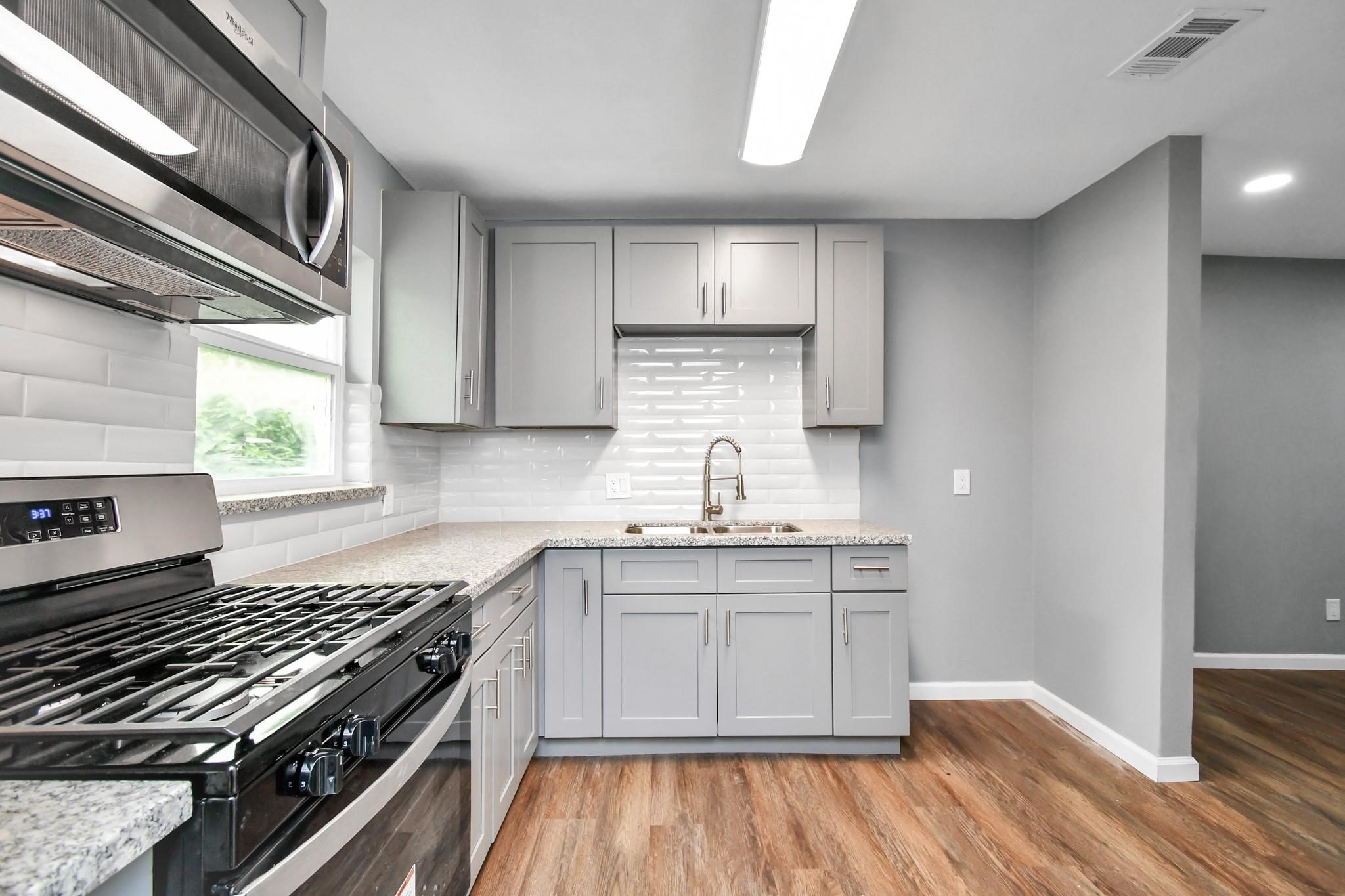 Stainless Steel Gas Range and Microwave