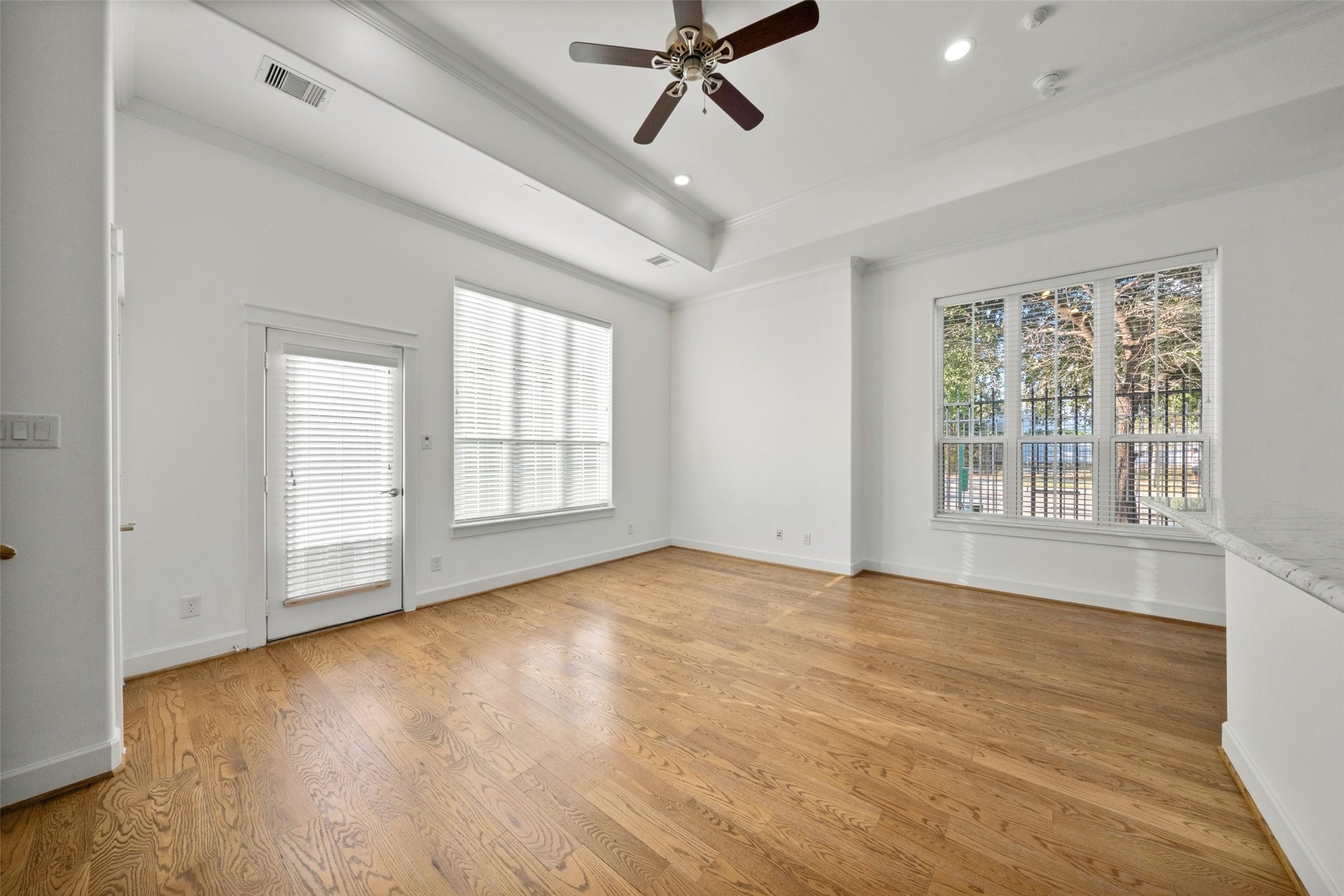 This space is ideal for modern living and entertaining! This bright, open-concept living space features large windows allowing for ample natural light. This space is ideal for modern living and entertaining! This bright, open-concept living space features large windows allowing for ample natural light.