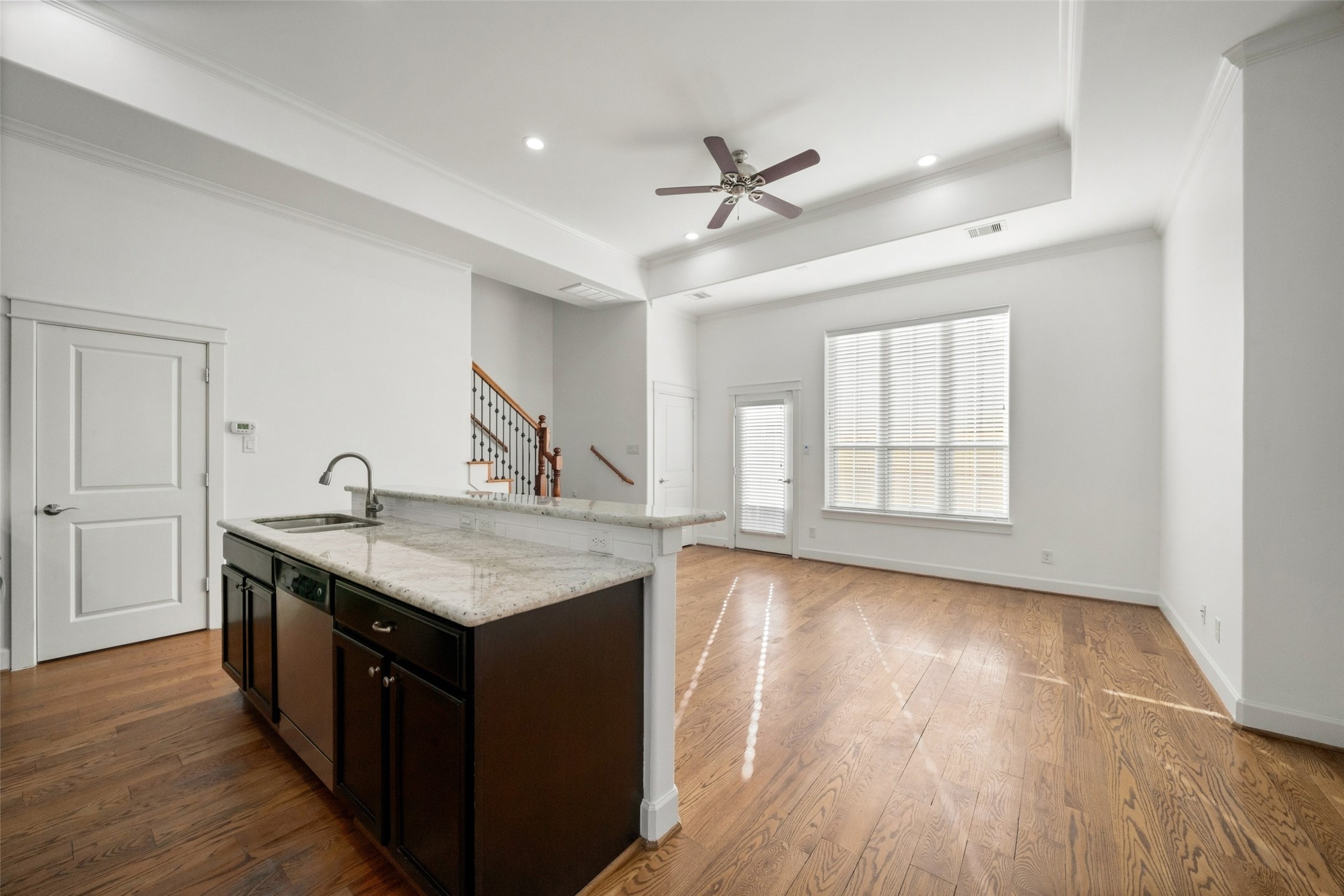 Real wood floors, recessed lighting, and crown molding continue into your kitchen and living room. Real wood floors, recessed lighting, and crown molding continue into your kitchen and living room.