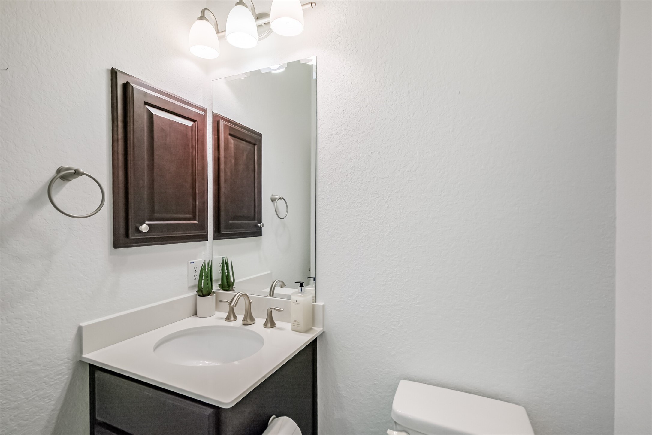 Dedicated half bath for the upstairs game room.