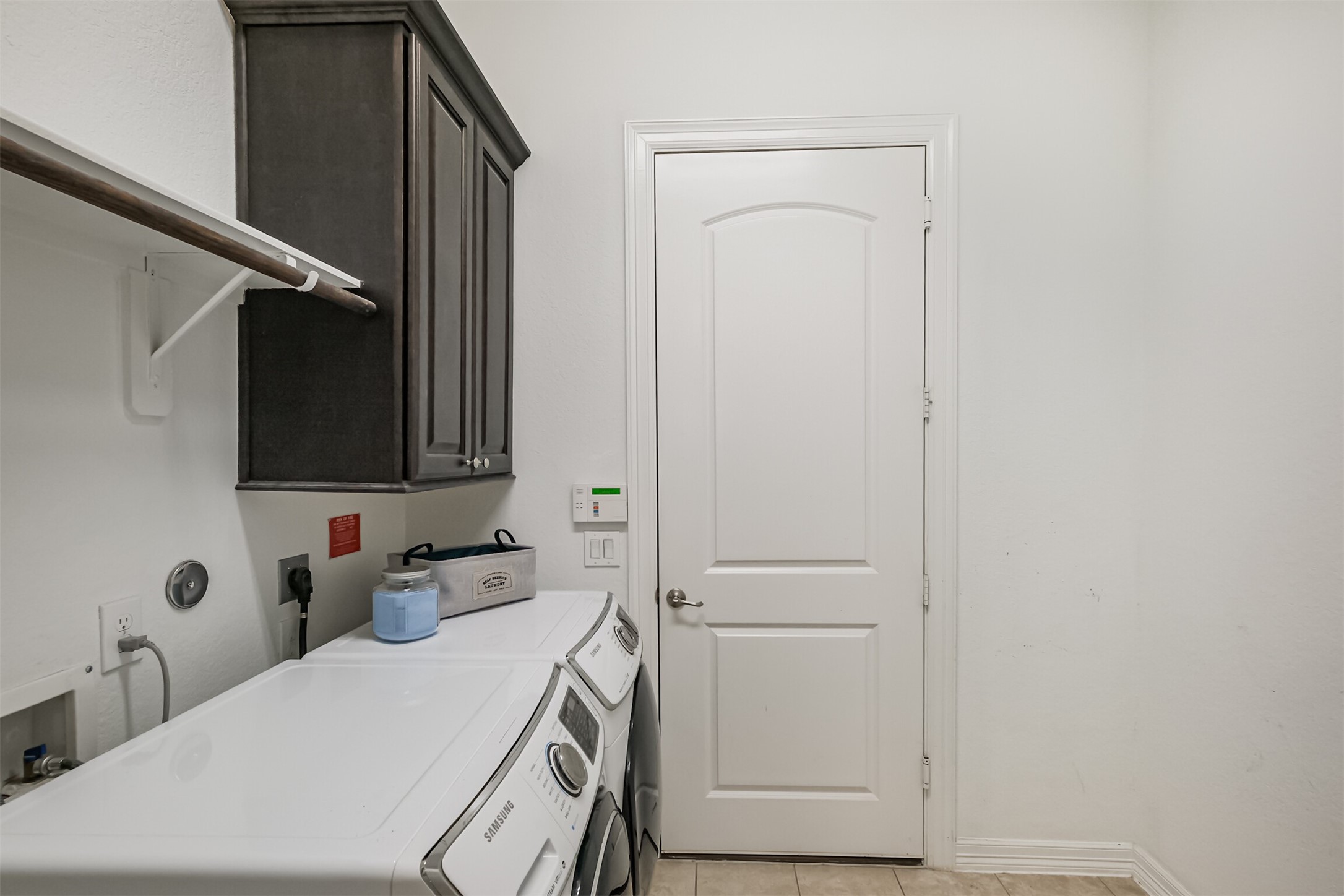 Laundry room located within the home.