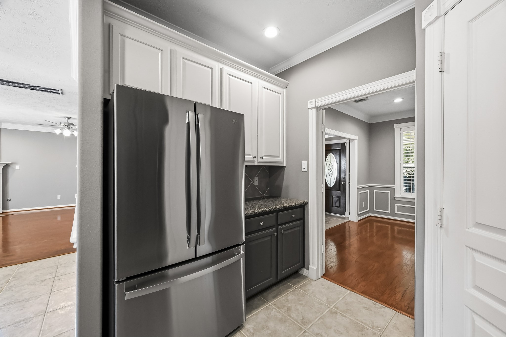 Brand-new stainless steel refrigerator complements the kitchen's granite countertops and abundant cabinet storage. Brand-new stainless steel refrigerator complements the kitchen's granite countertops and abundant cabinet storage.