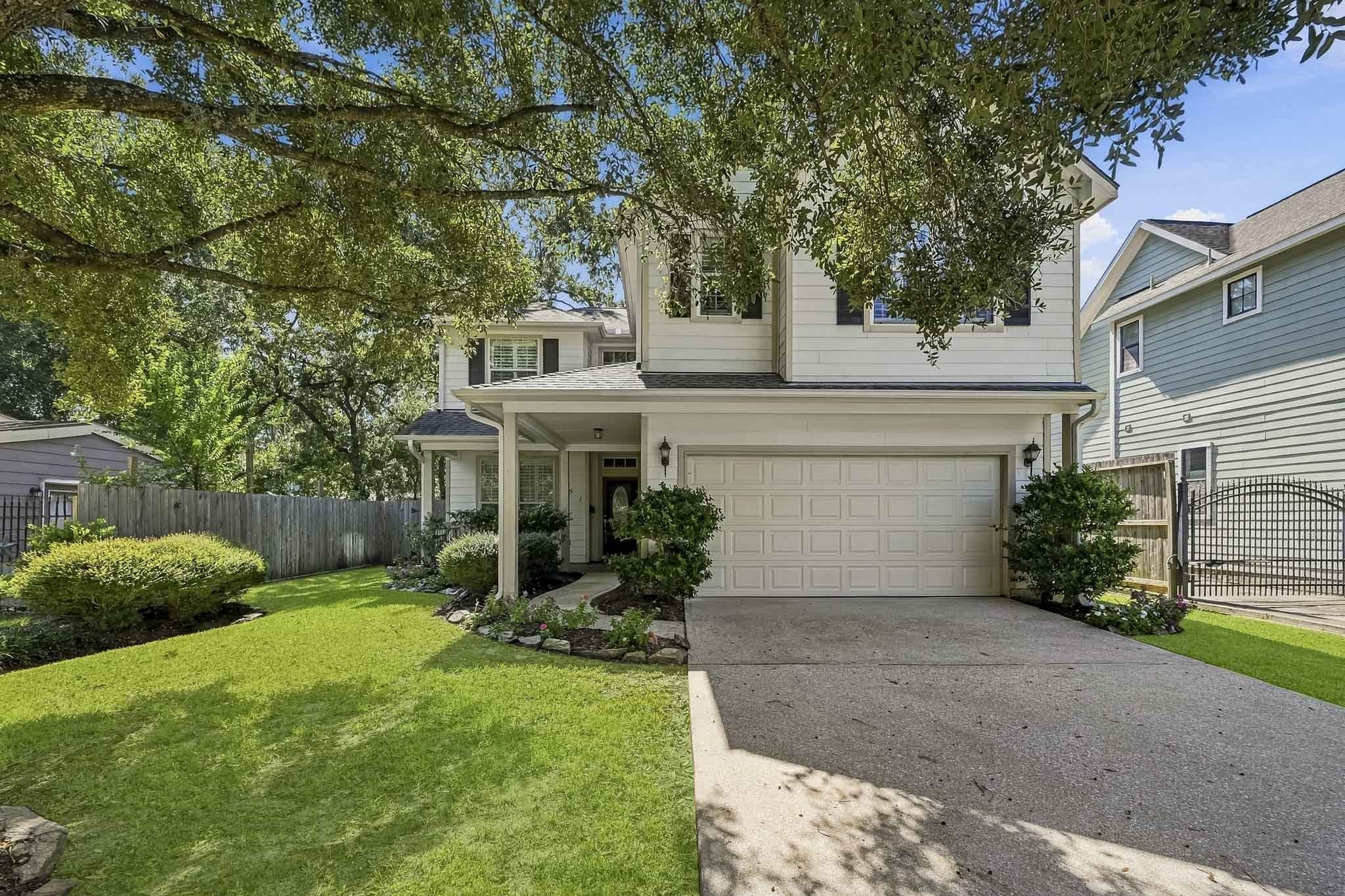 Beautiful two-story home situated on a spacious, tree-shaded lot in the desirable Garden Oaks area.