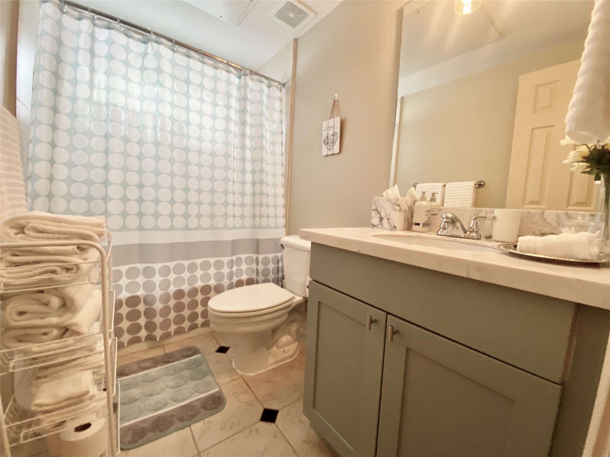 Full Bathroom directly outside of both secondary bedrooms