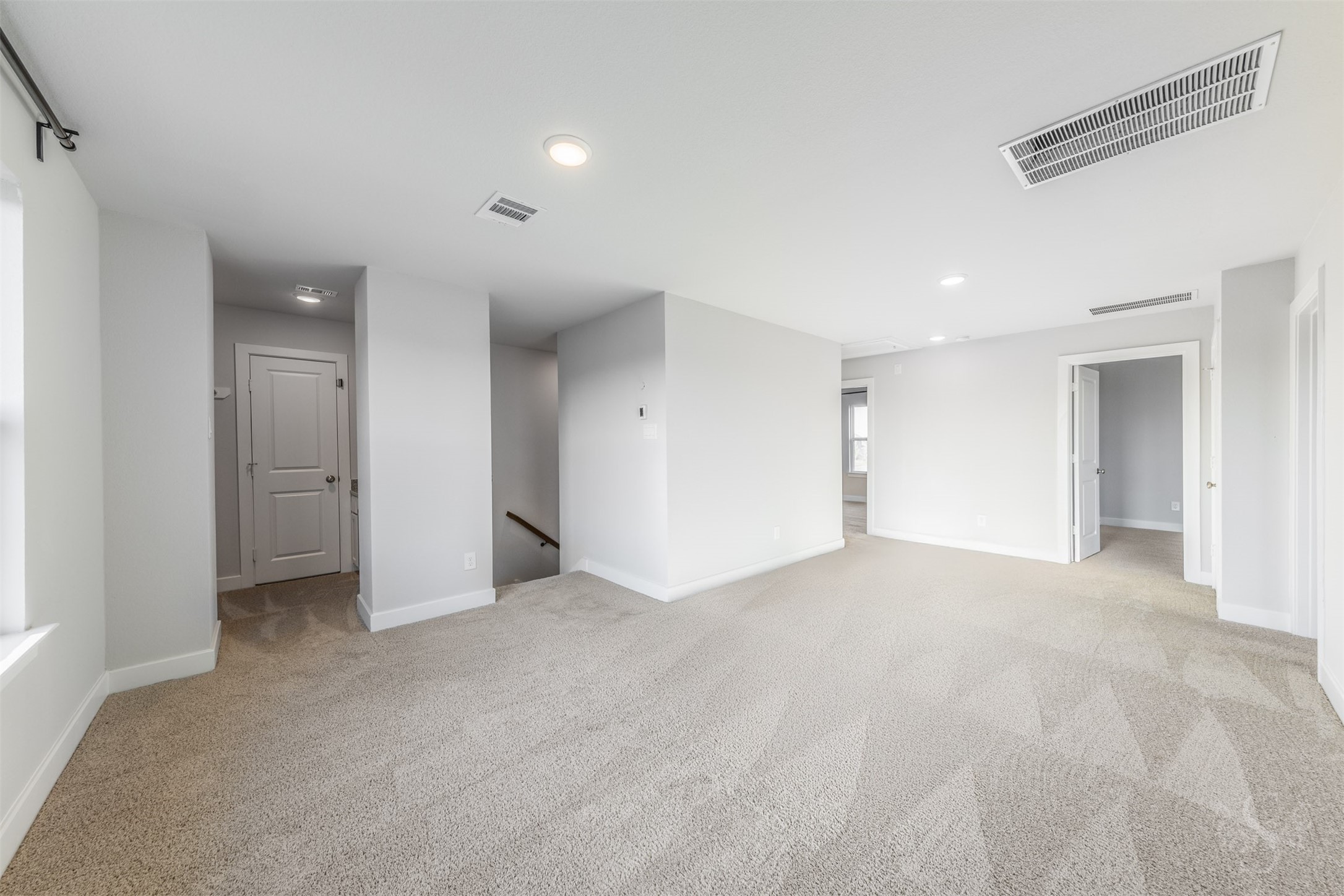 The generous upstairs game room offers a comfortable gathering place for family fun and entertaining friends. Its versatile layout provides plenty of space for a favorite game table, cozy seating and a play area.