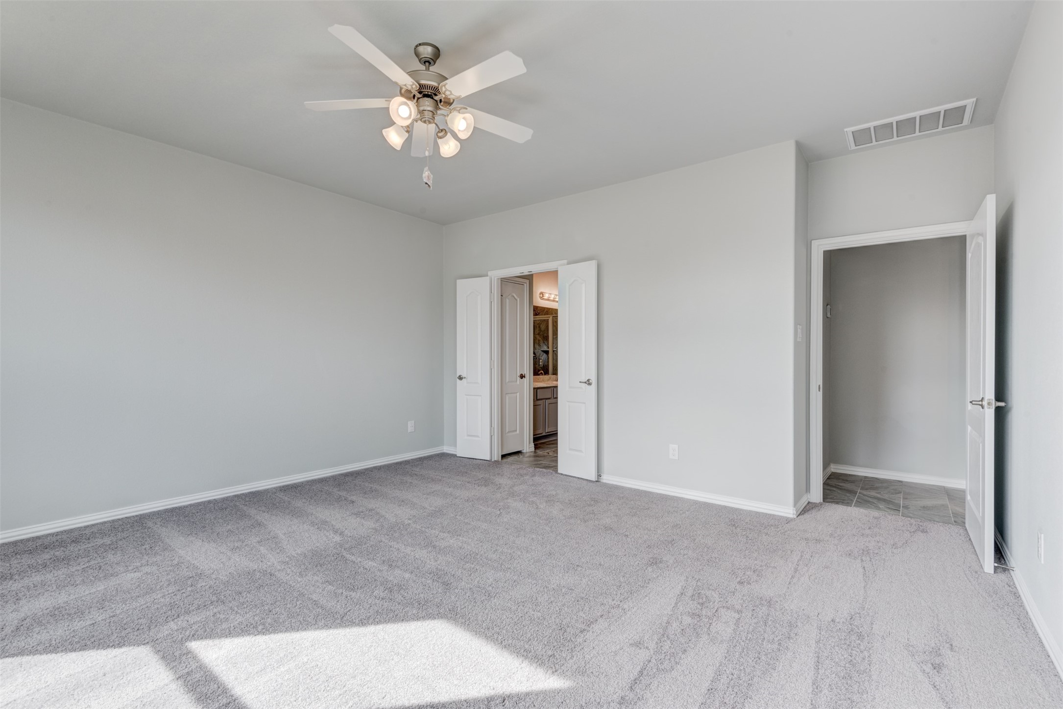 High ceilings in the primary suite