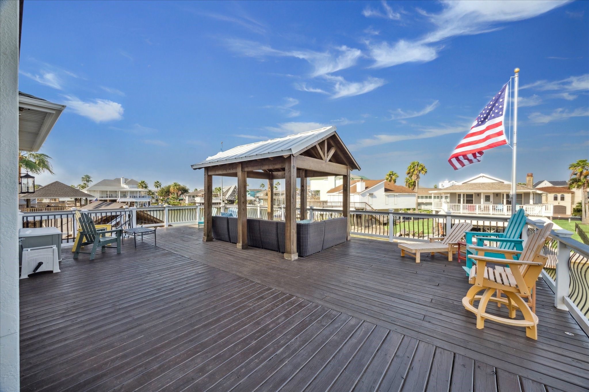 pergola off the family room level that provides the comfort of shade and lots of breezy air!