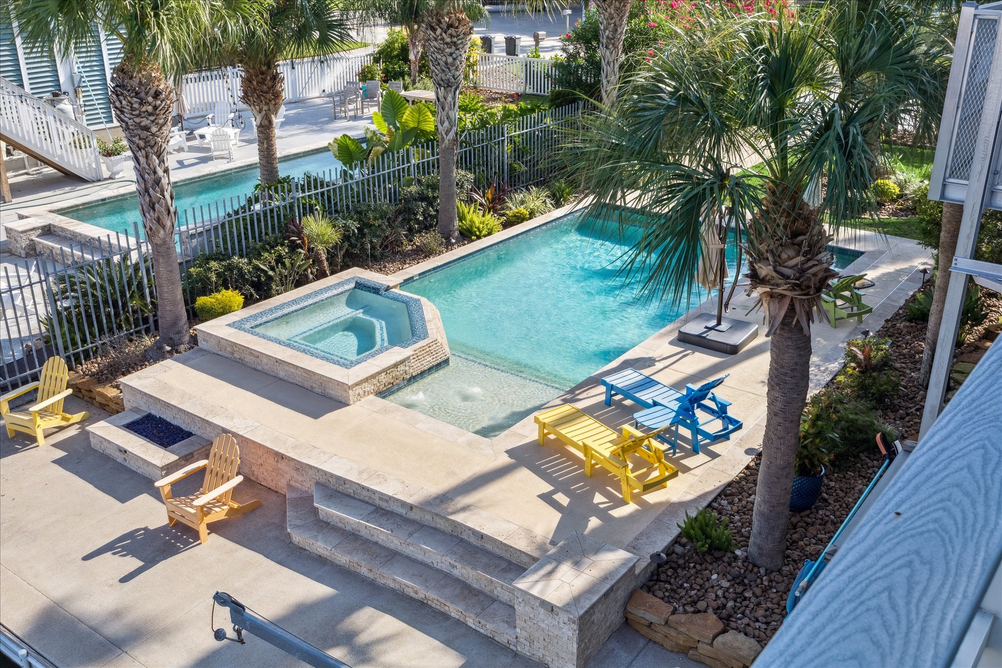 pool view illustrating the fire pit fun
