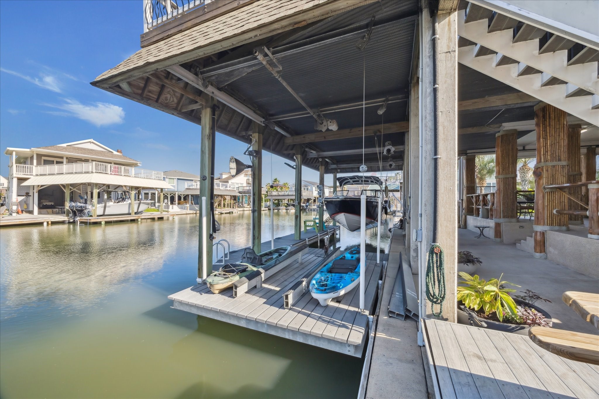 jet ski lift/small boat lift/or paddle boat lift also has the larger boat lift nearby and don't forget all the extra offshore boat parking available.
