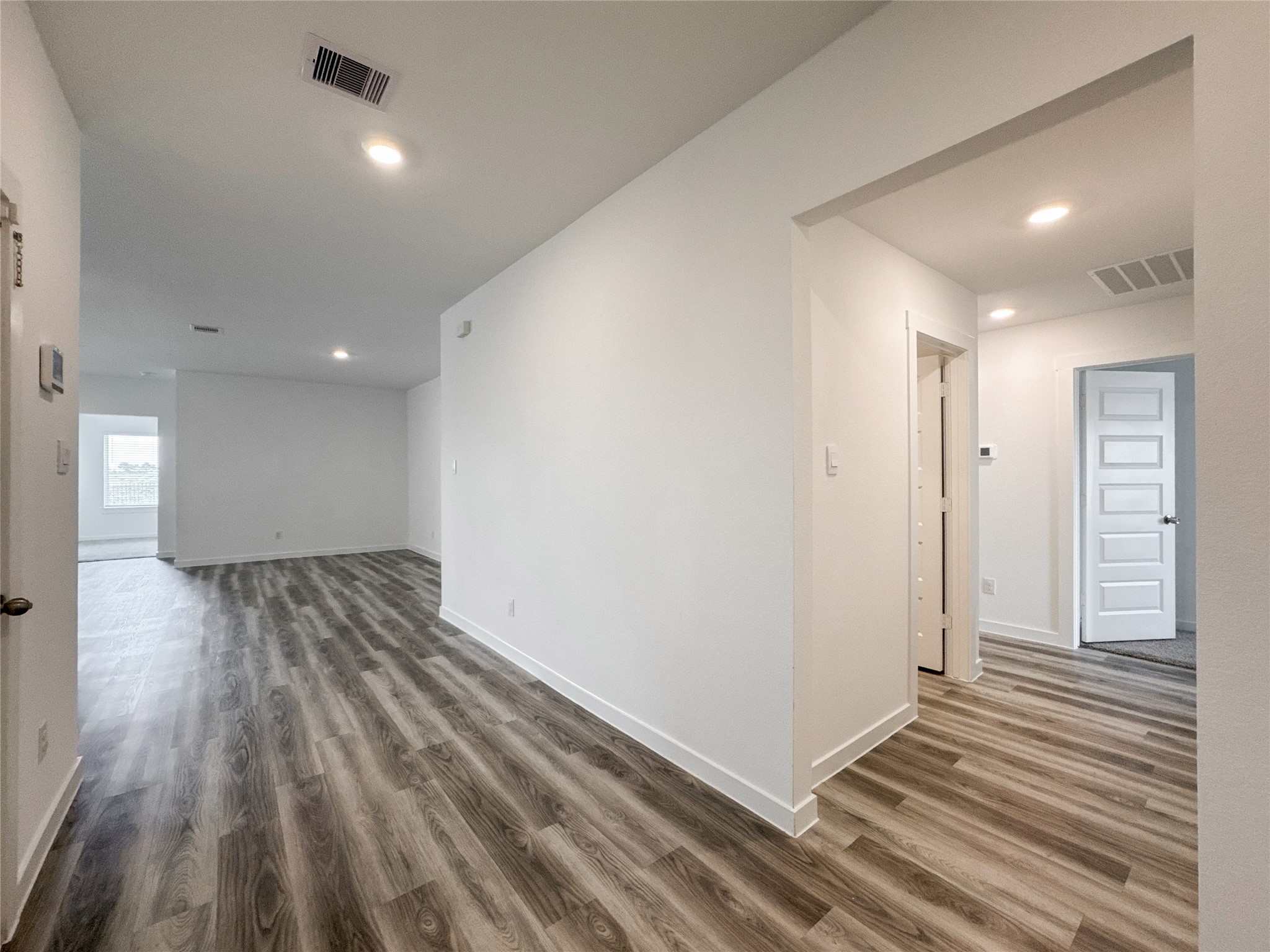 Entry from front door near Comfort Room with tub