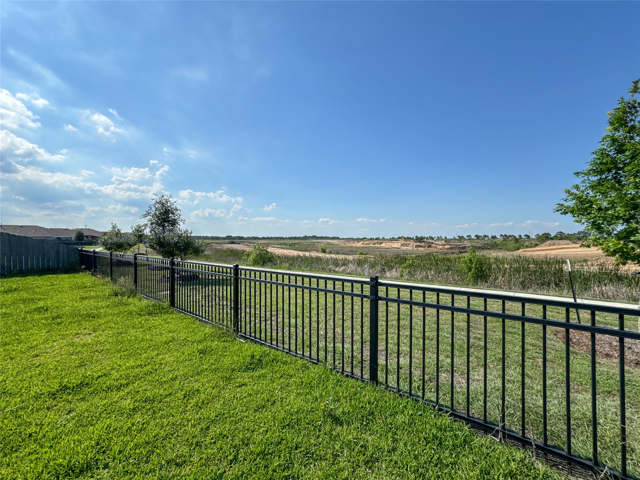 Backyard View overlooking beyond lot perimeter