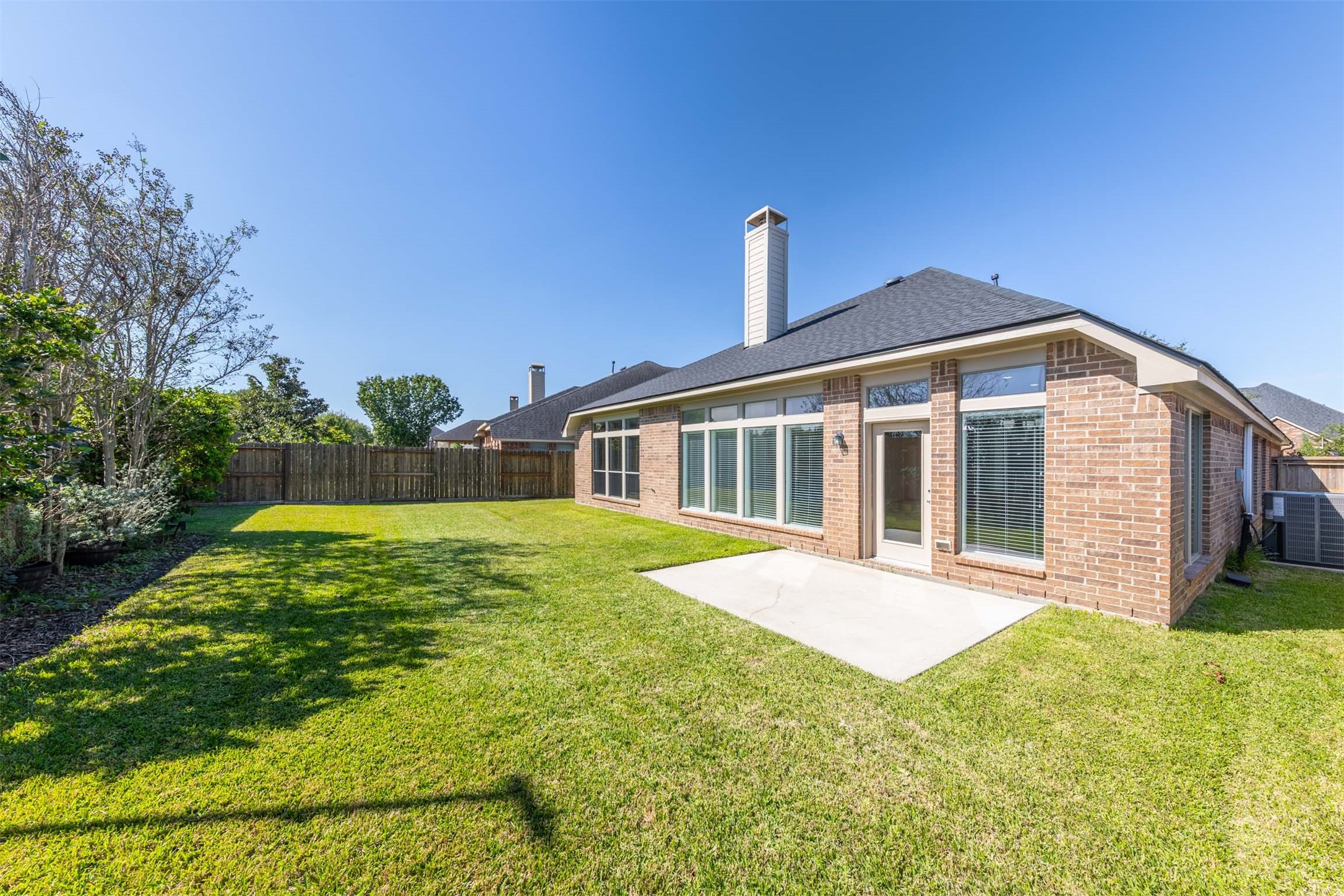 Step into the back yard to enjoy a peaceful afternoon or an evening under the stars with no back neighbors!