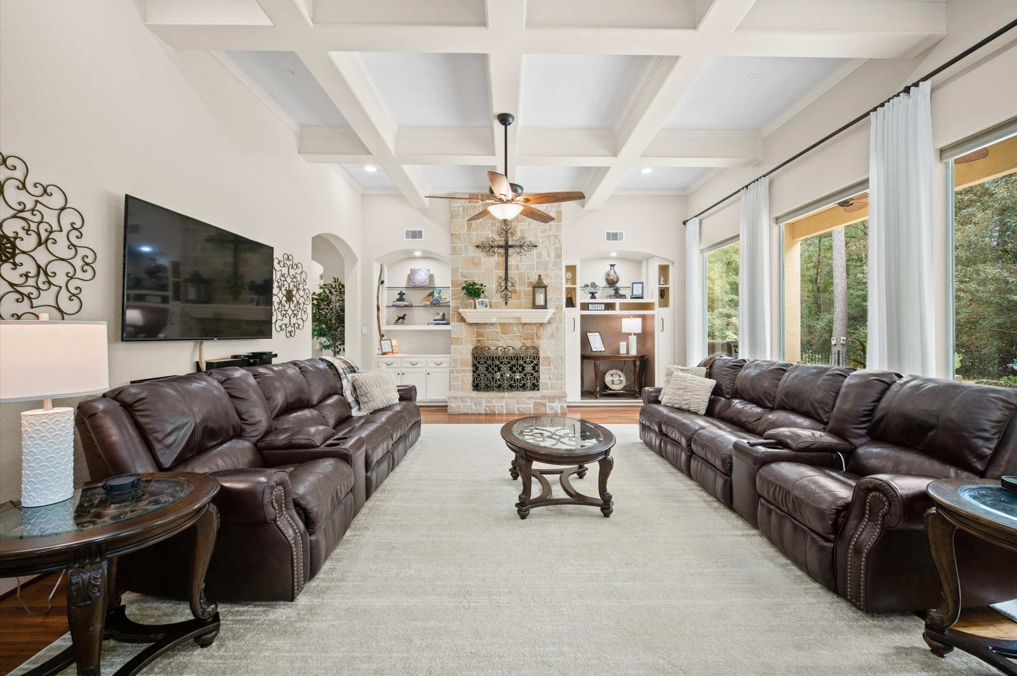Spacious family room with abundant natural light and views of the private backyard